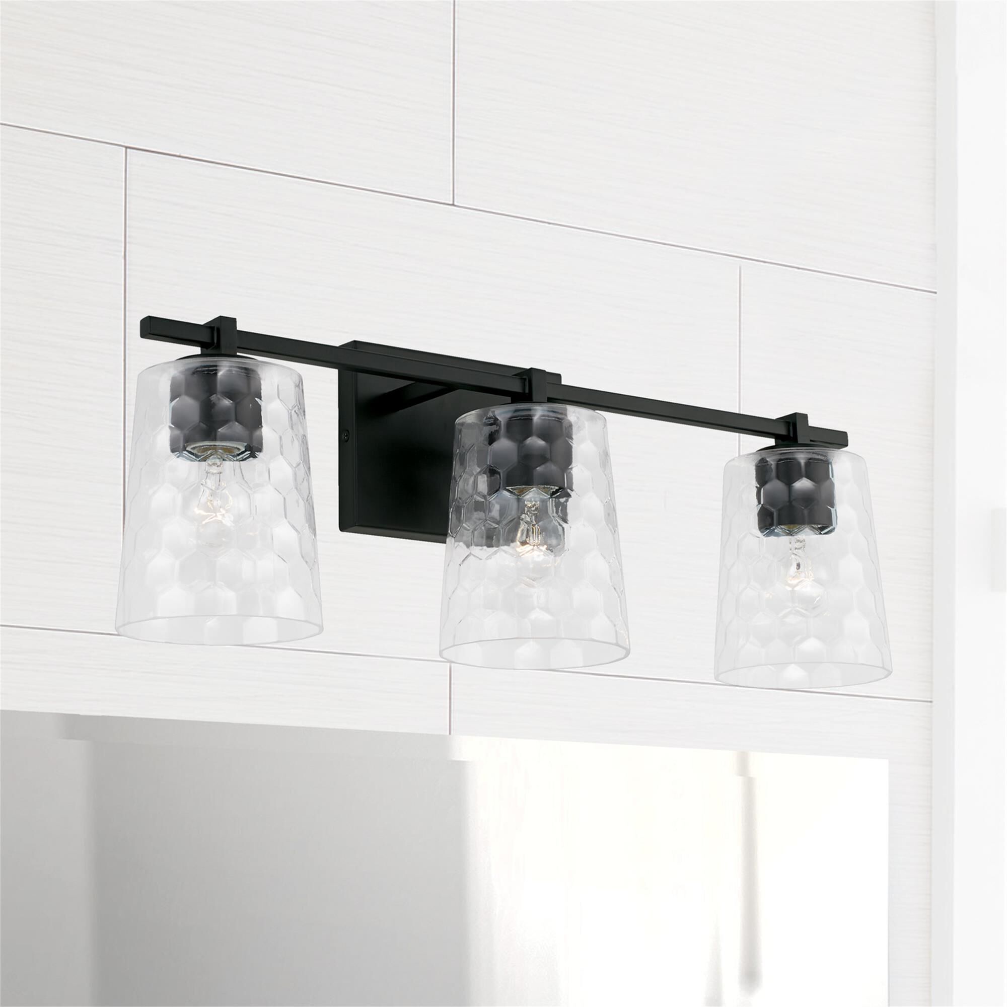 Shown in Matte Black finish and Clear Honeycomb glass