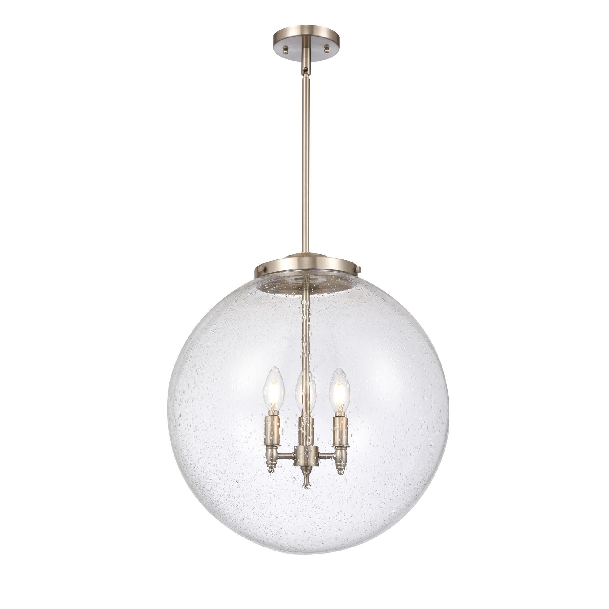 Shown in Brushed Satin Nickel finish and Seedy Beacon glass