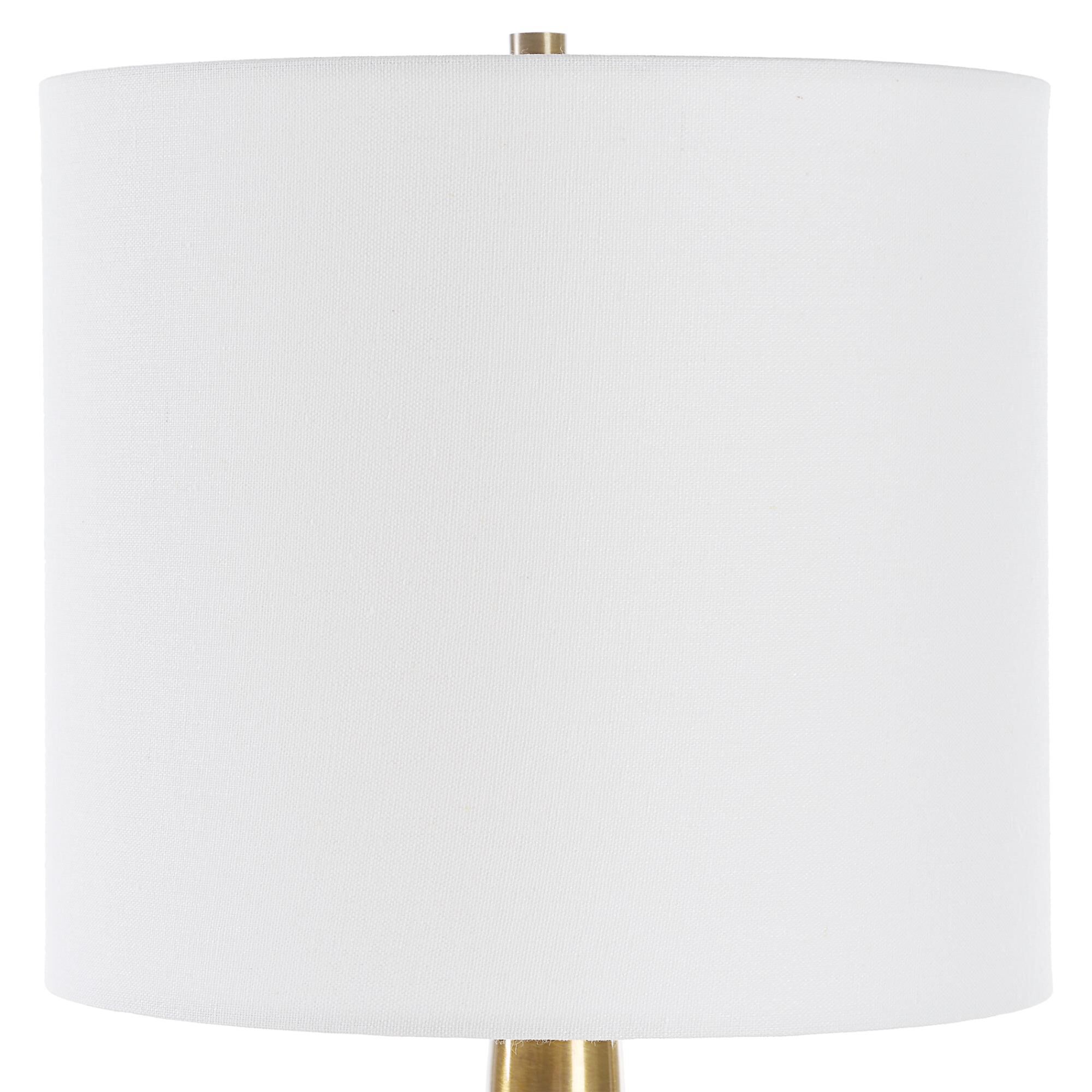 Shown in Black and Brass finish and Round Drum Hardback shade