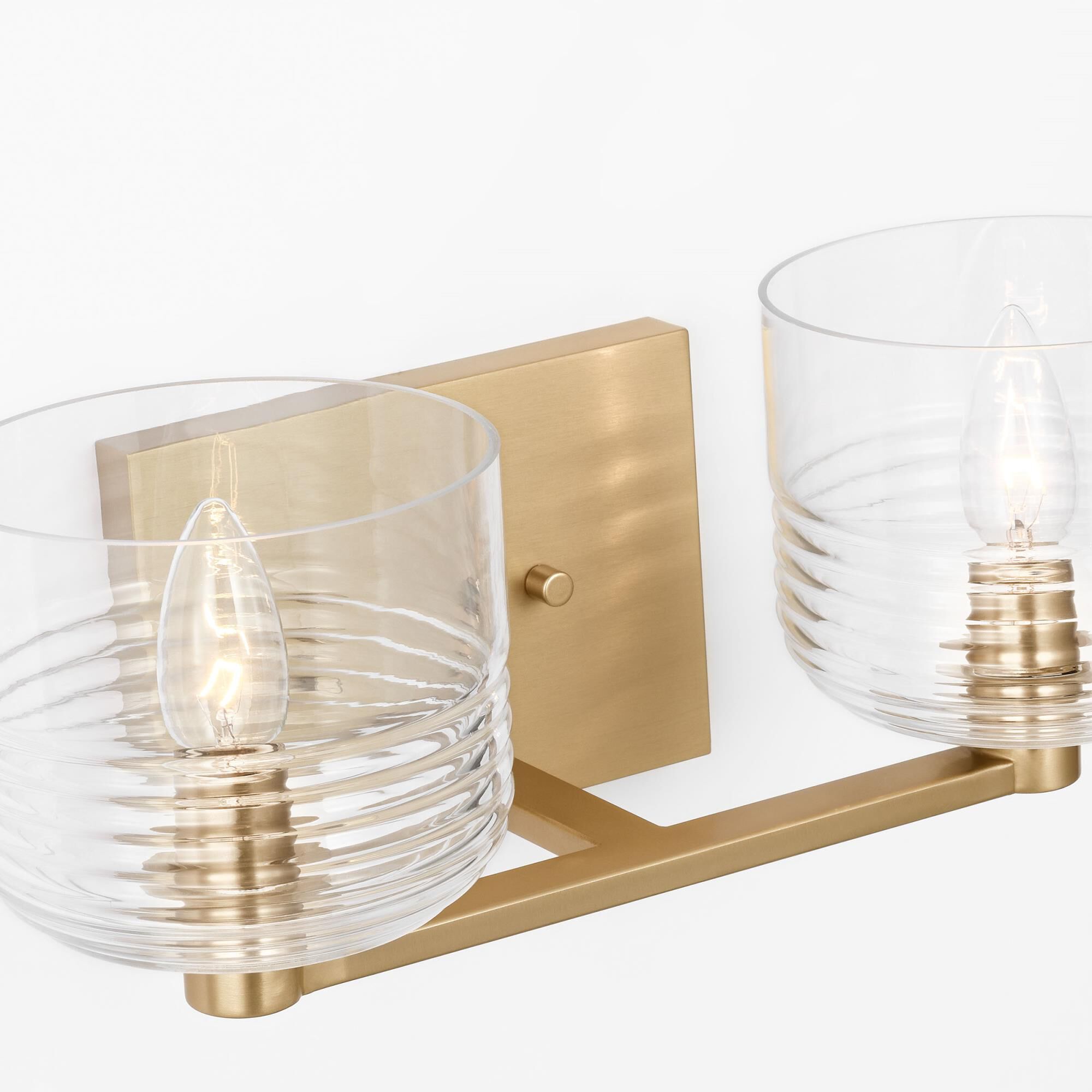 Shown in Satin Brass finish and Clear Ribbed glass