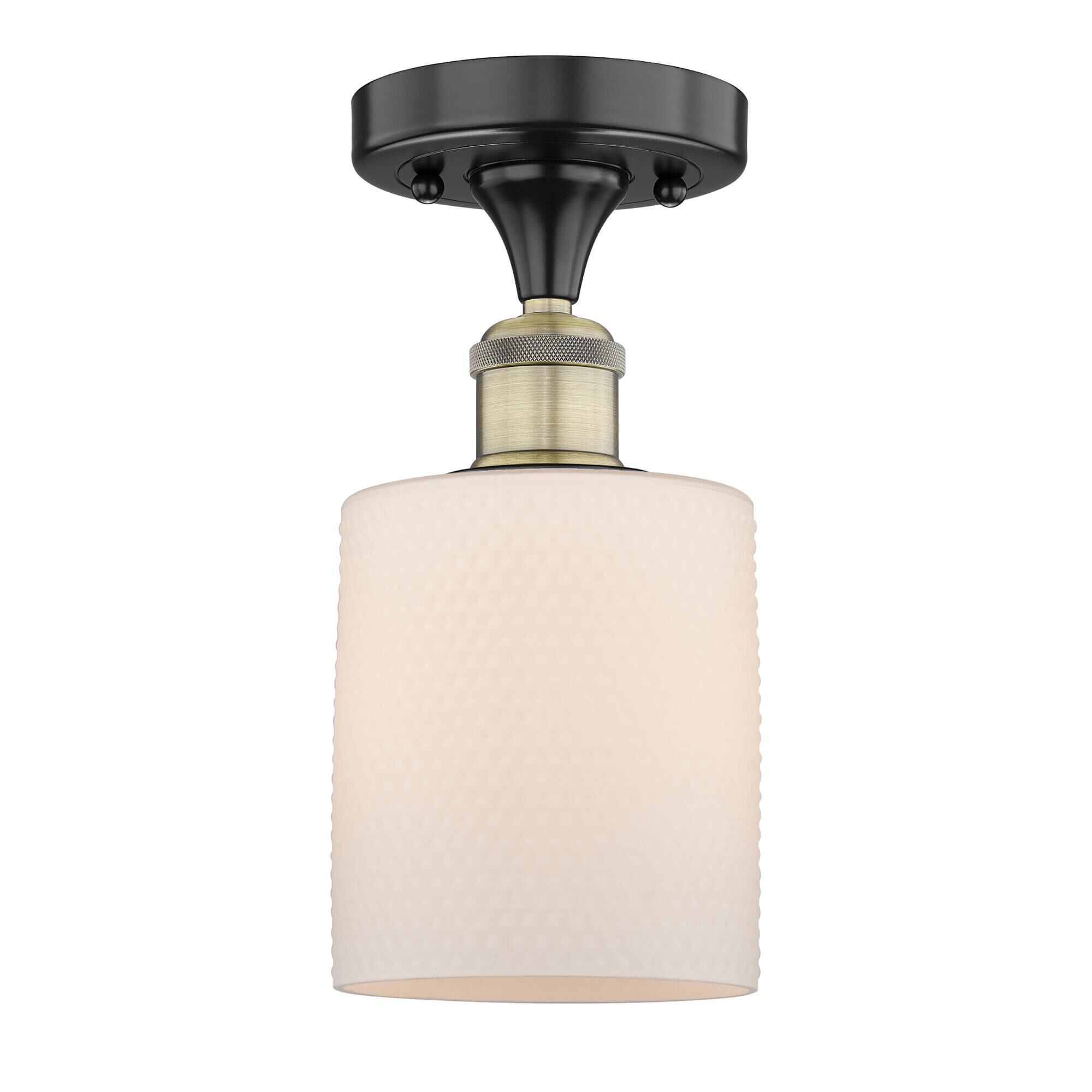 Shown in Black Antique Brass finish and Matte White glass