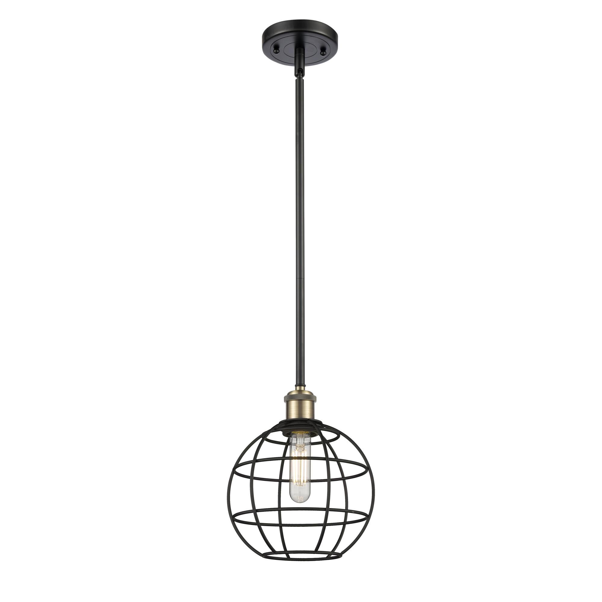 Shown in Black Antique Brass finish and Matte Black shade