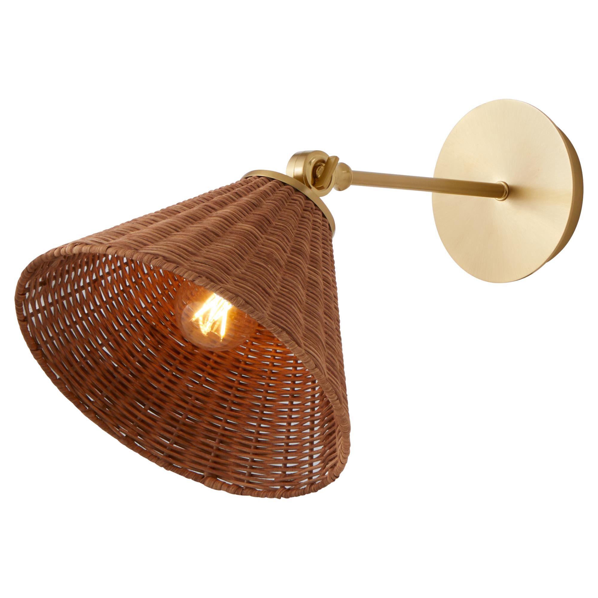 Shown in Aged Brass finish and Wicker shade