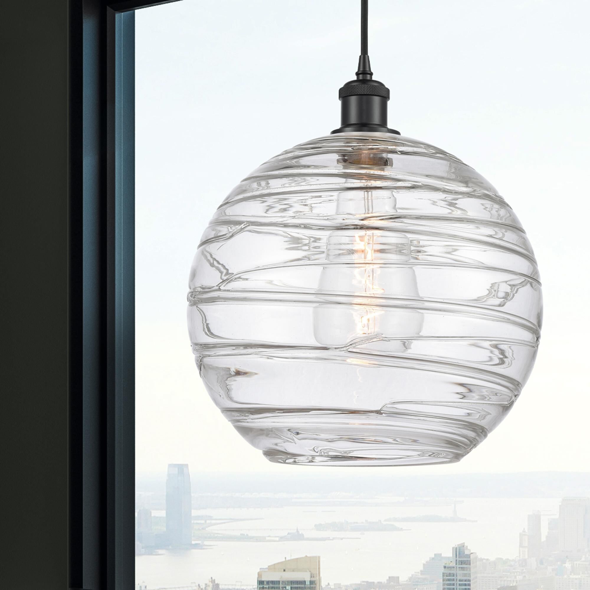 Shown in Matte Black finish and Transparent Deco Swirl glass