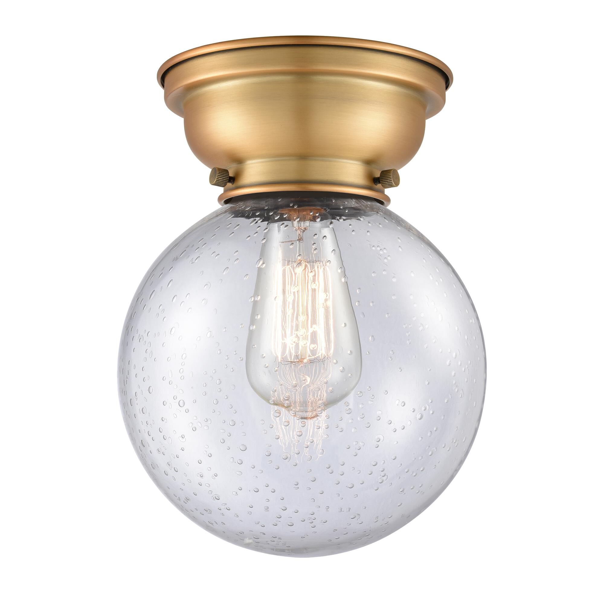 Shown in Brushed Brass finish and Seedy Beacon glass