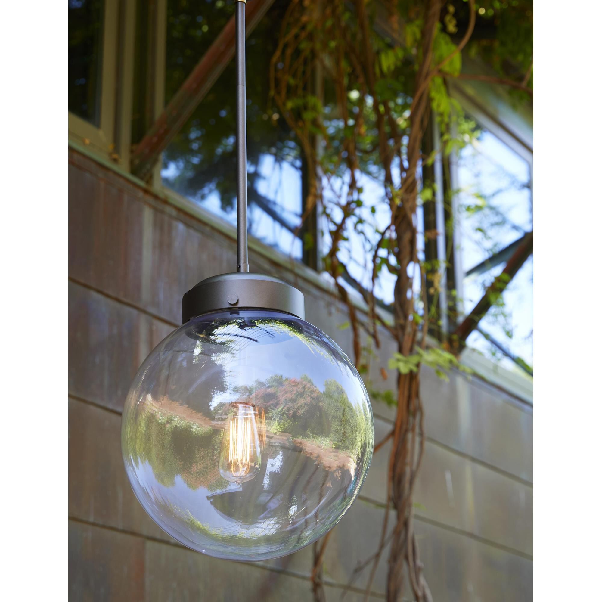 Shown in Aged Brass finish and Clear glass