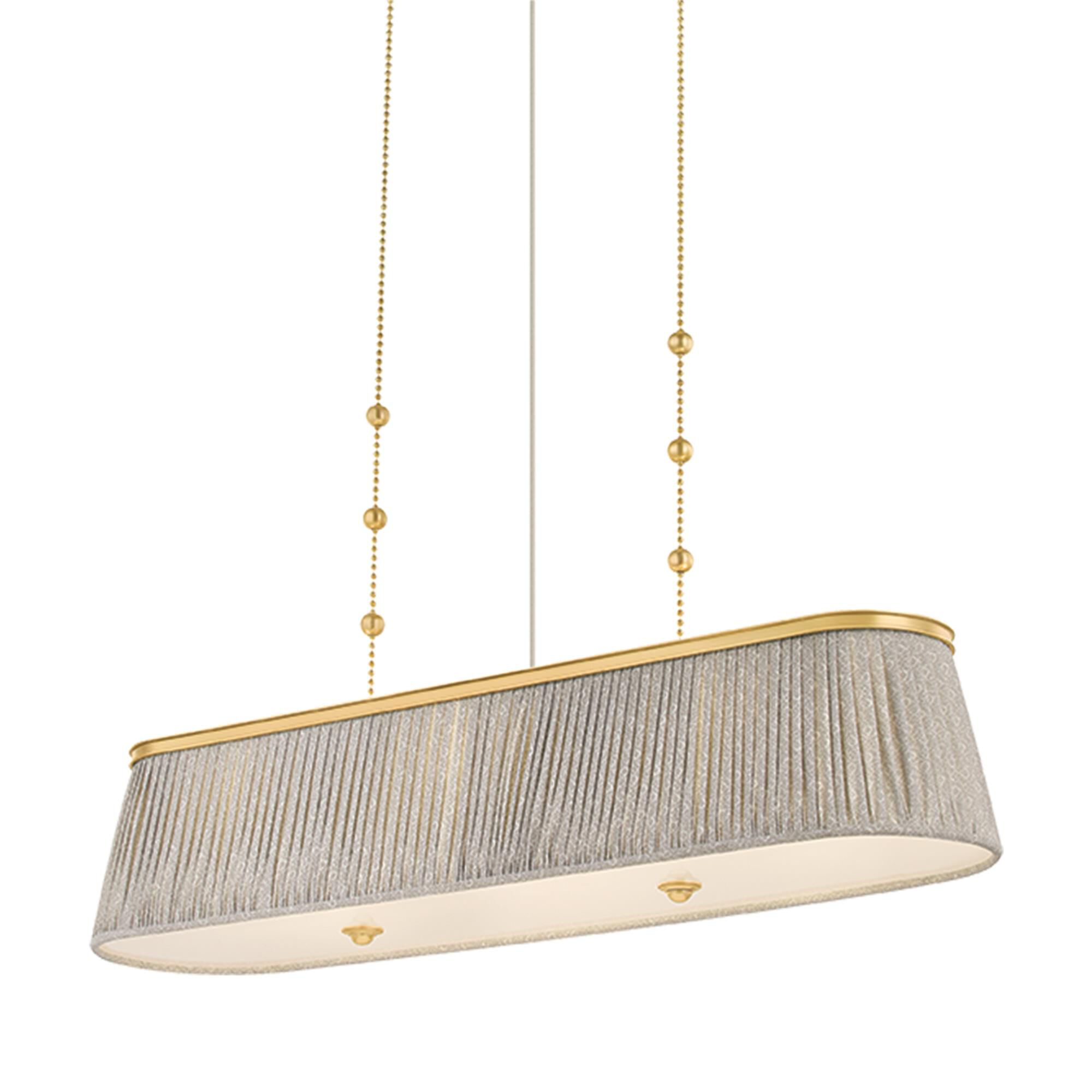 Shown in Aged Brass finish and Gathered Printed Cotton shade
