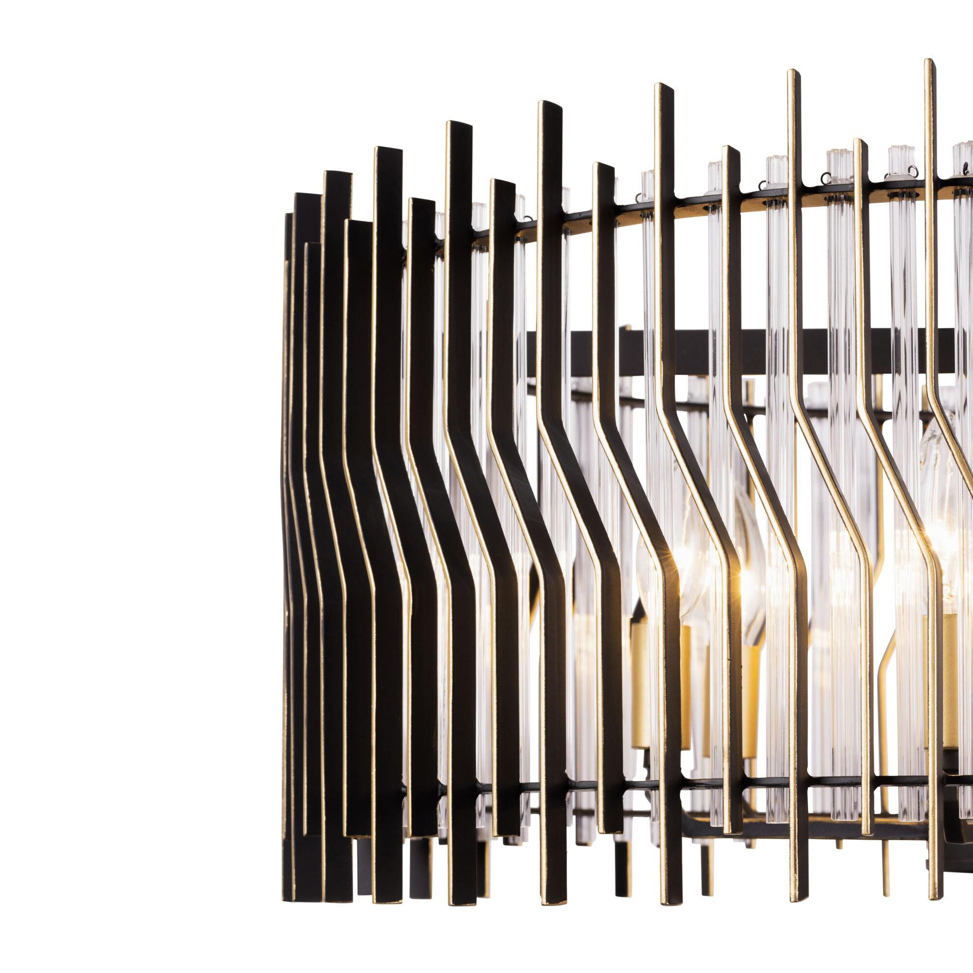 Shown in Matte Black/French Gold finish and Modern Clear Fluted shade