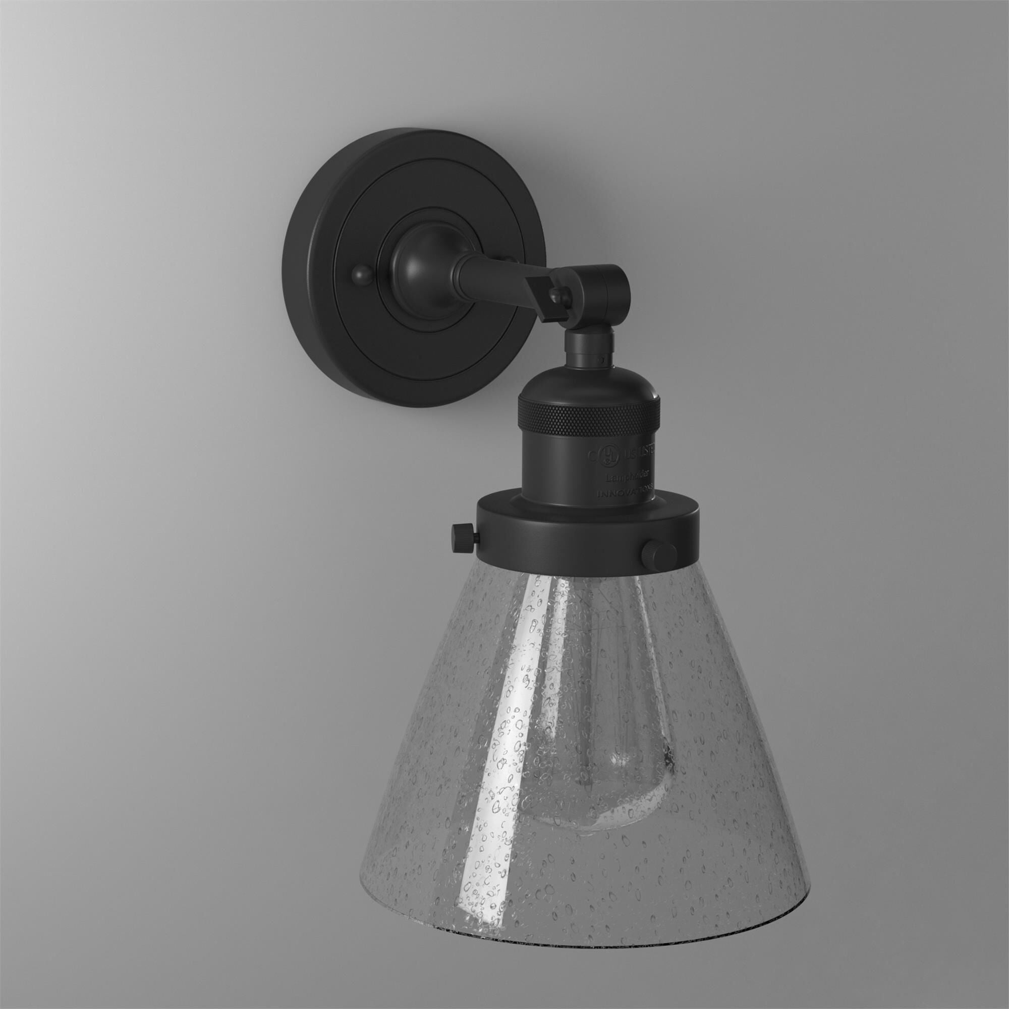 Shown in Oil Rubbed Bronze finish and Seedy glass