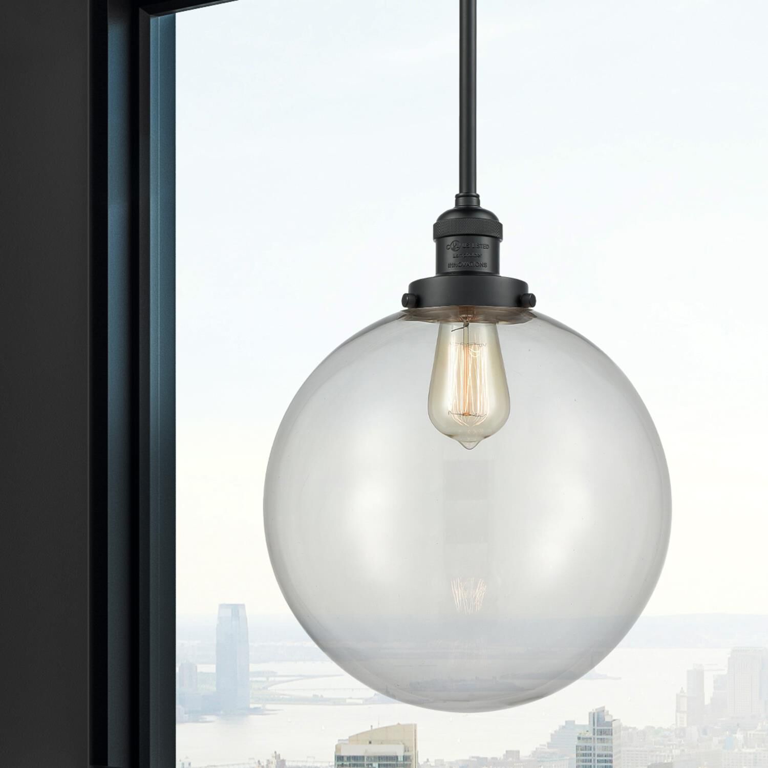 Shown in Matte Black finish and Clear Beacon glass