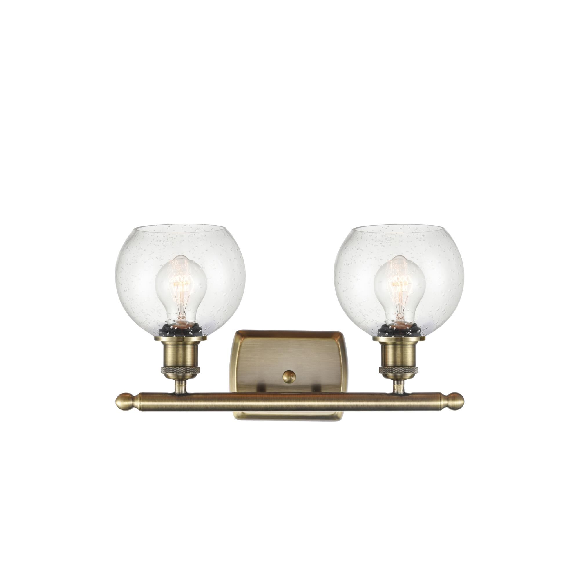 Shown in Antique Brass finish and Seedy Athens glass and No Shade shade