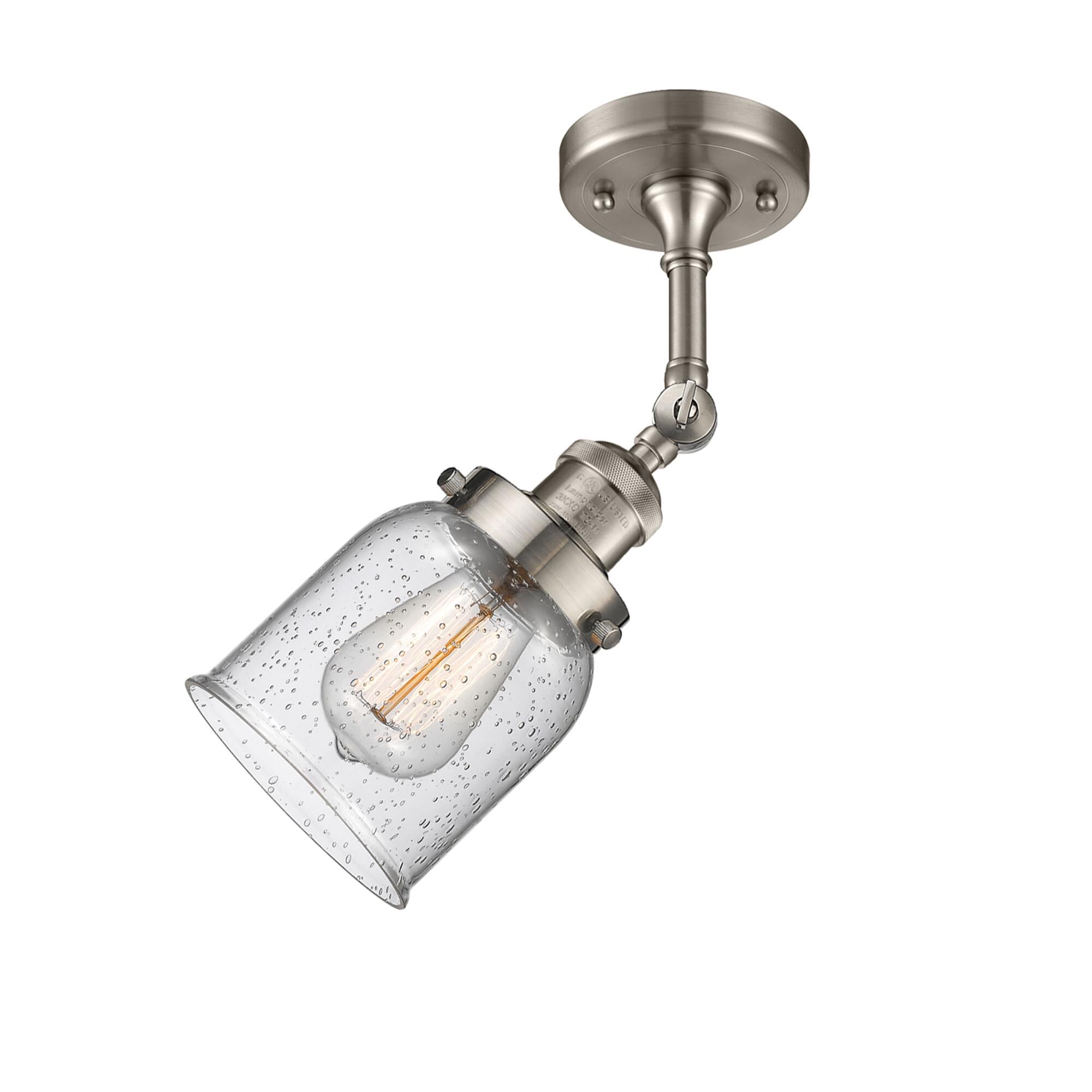 Shown in Brushed Satin Nickel finish and Seedy glass and None accent