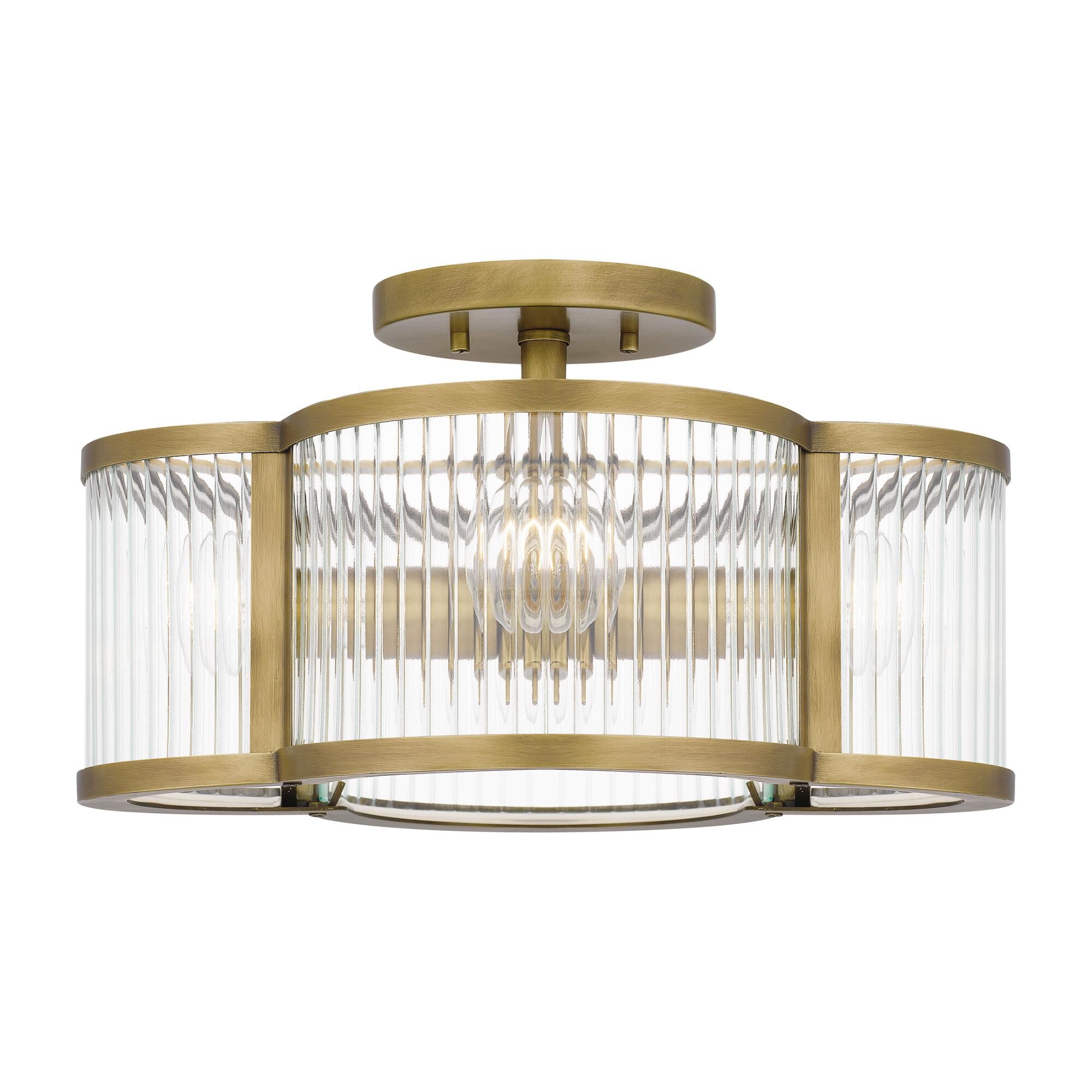 Shown in Weathered Brass finish and Clear Ribbed glass