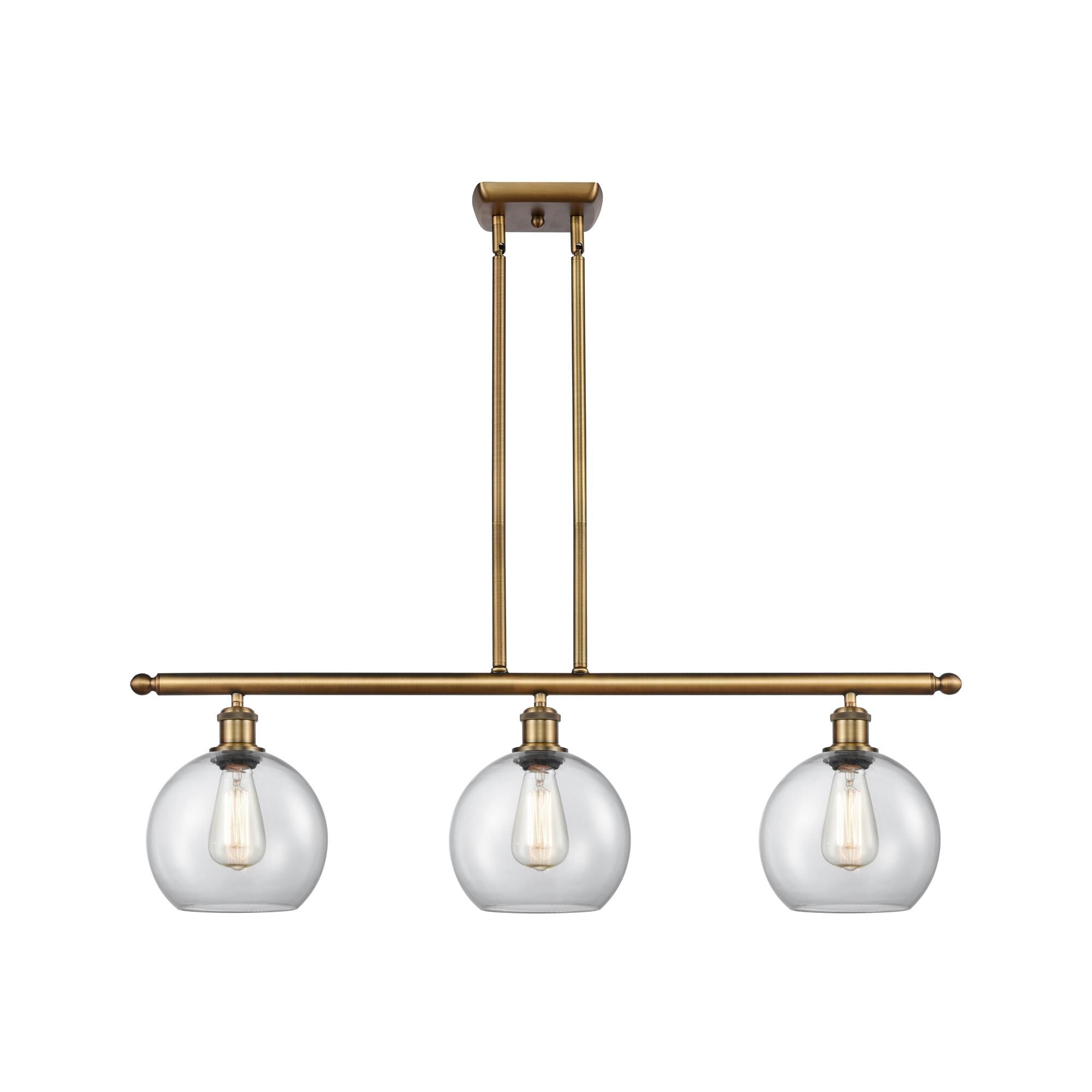 Shown in Brushed Brass finish and Clear Athens glass