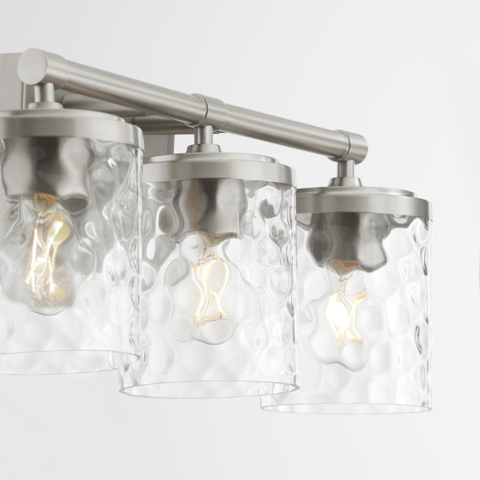 Shown in Satin Nickel finish and Clear Hammered glass