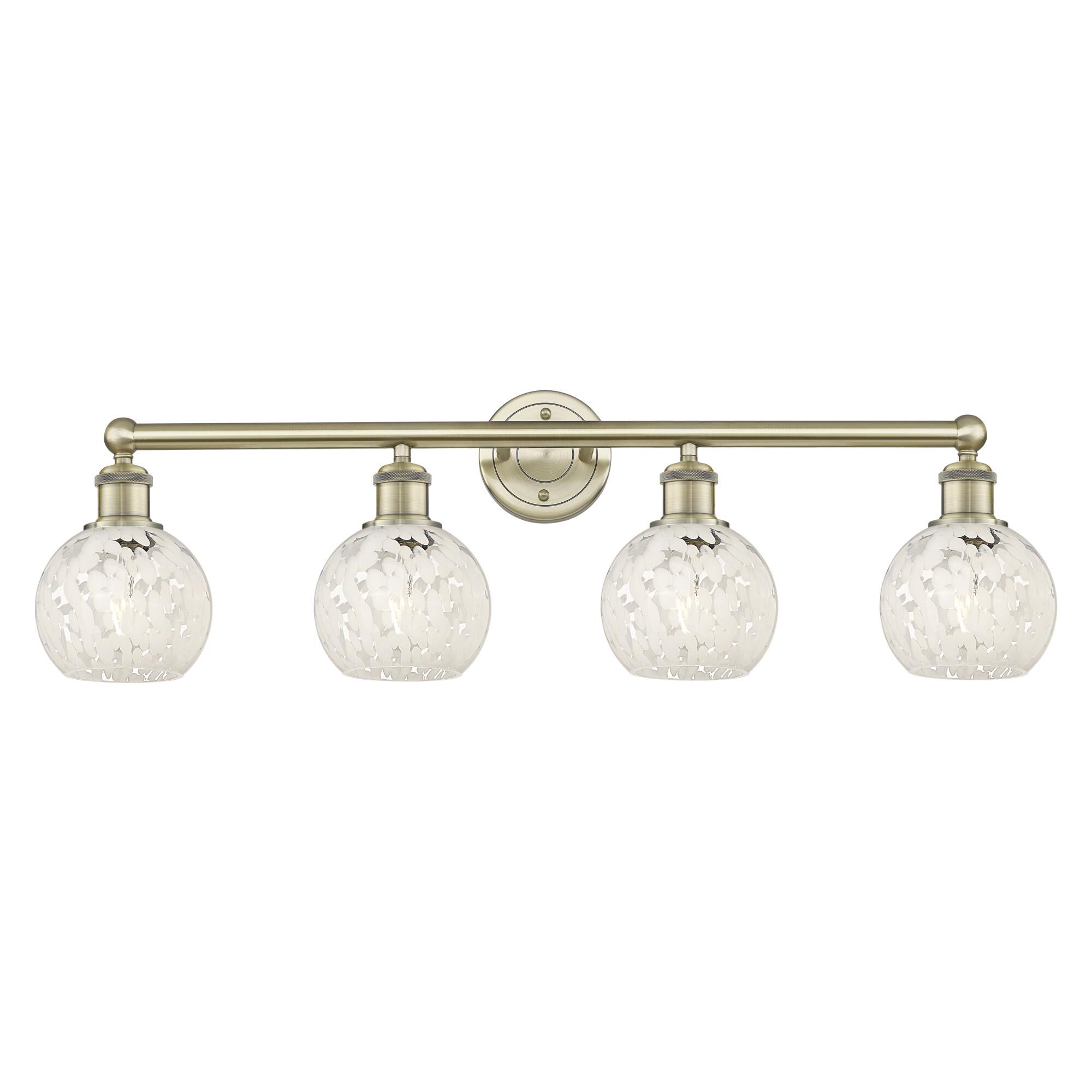 Shown in Antique Brass finish and White Mouchette glass
