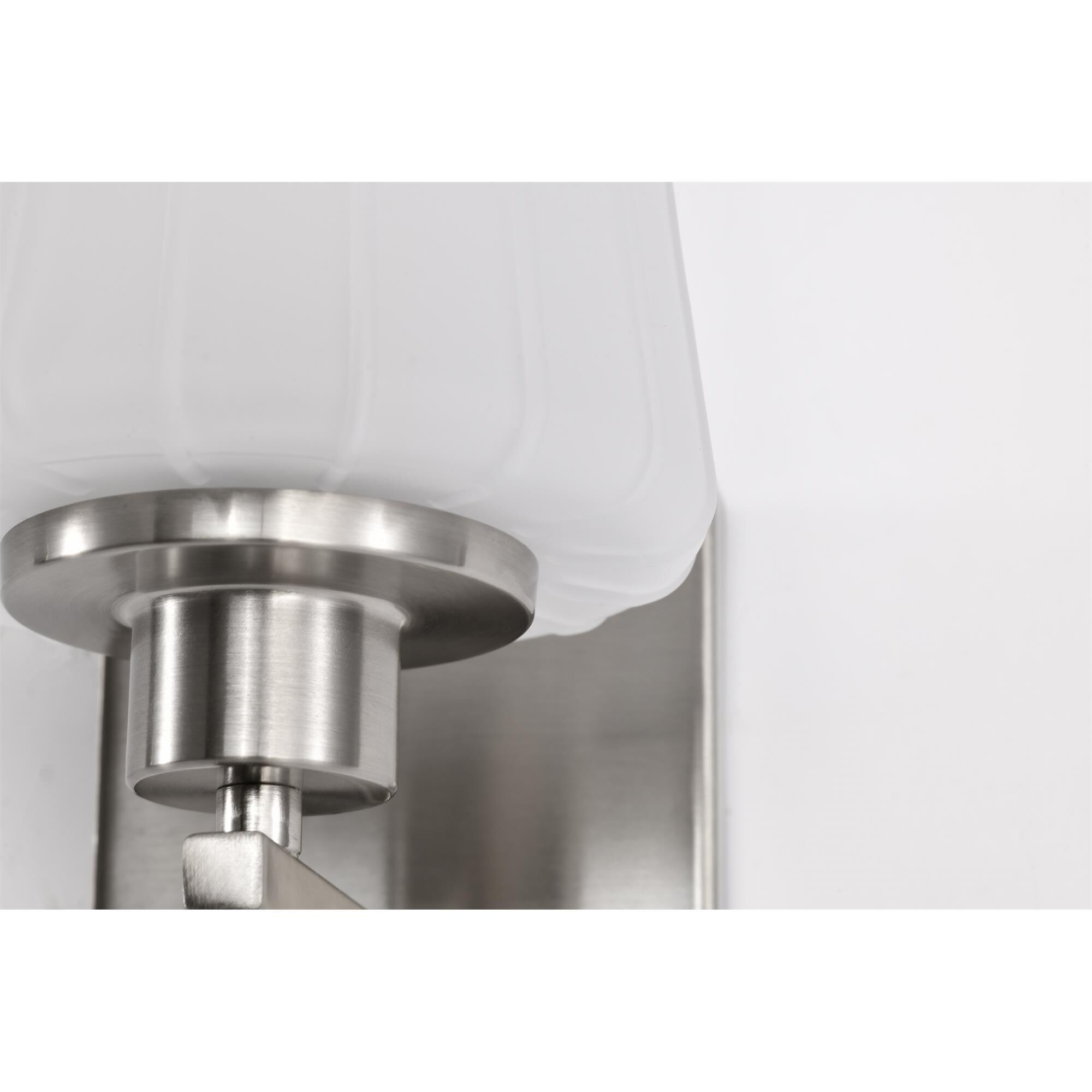 Shown in Brushed Nickel finish and Etched White glass