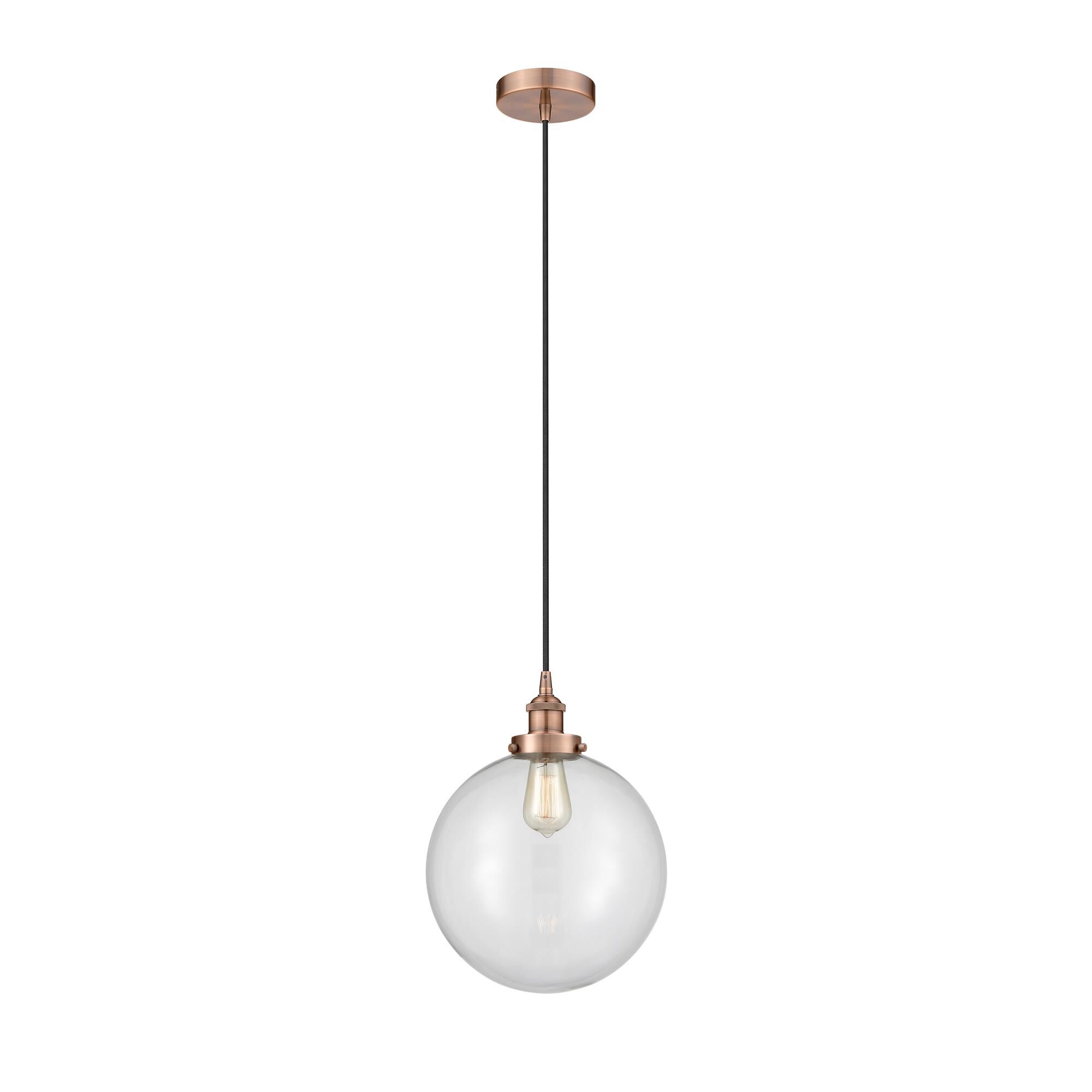 Shown in Antique Copper finish and Clear Beacon glass