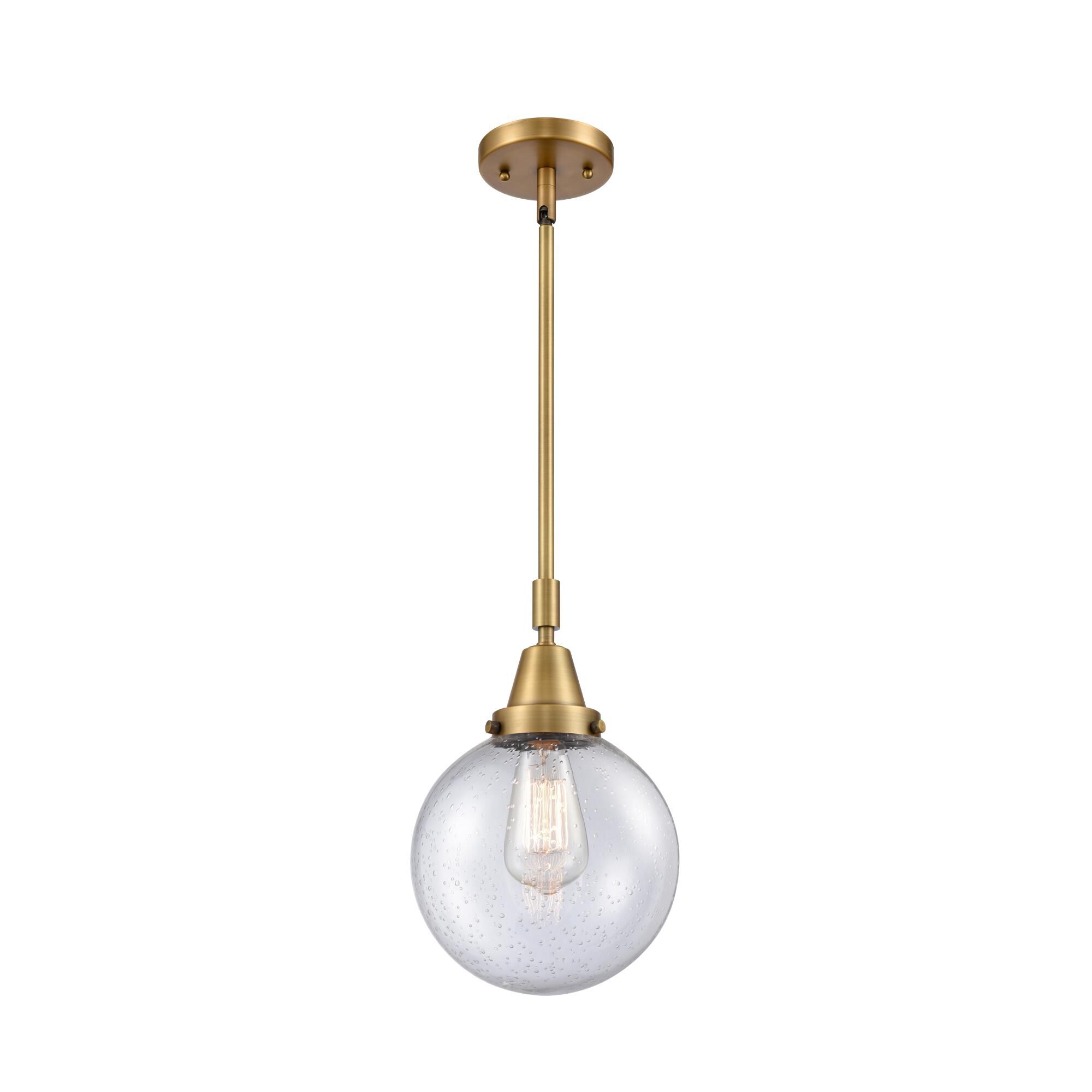 Shown in Brushed Brass finish and Seedy Beacon glass