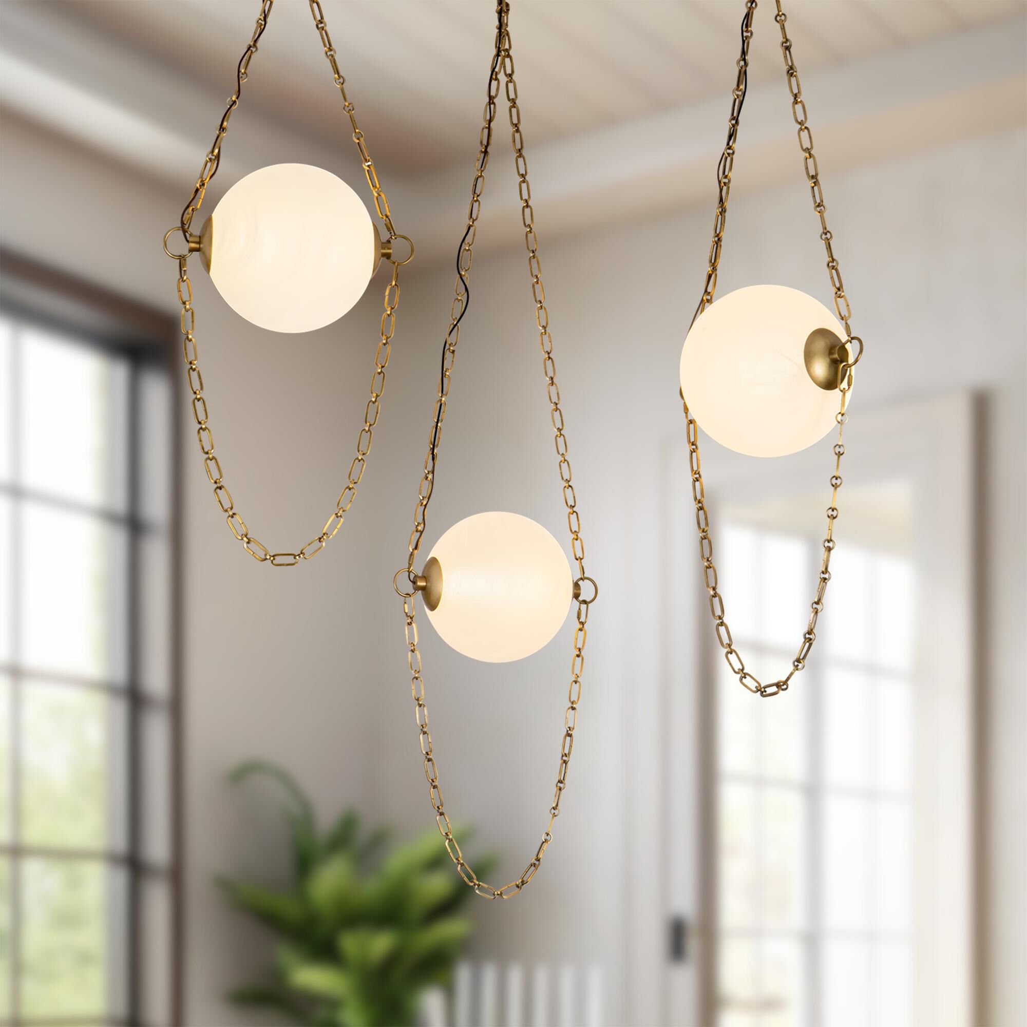 Shown in Vintage Brass finish and Cloud glass