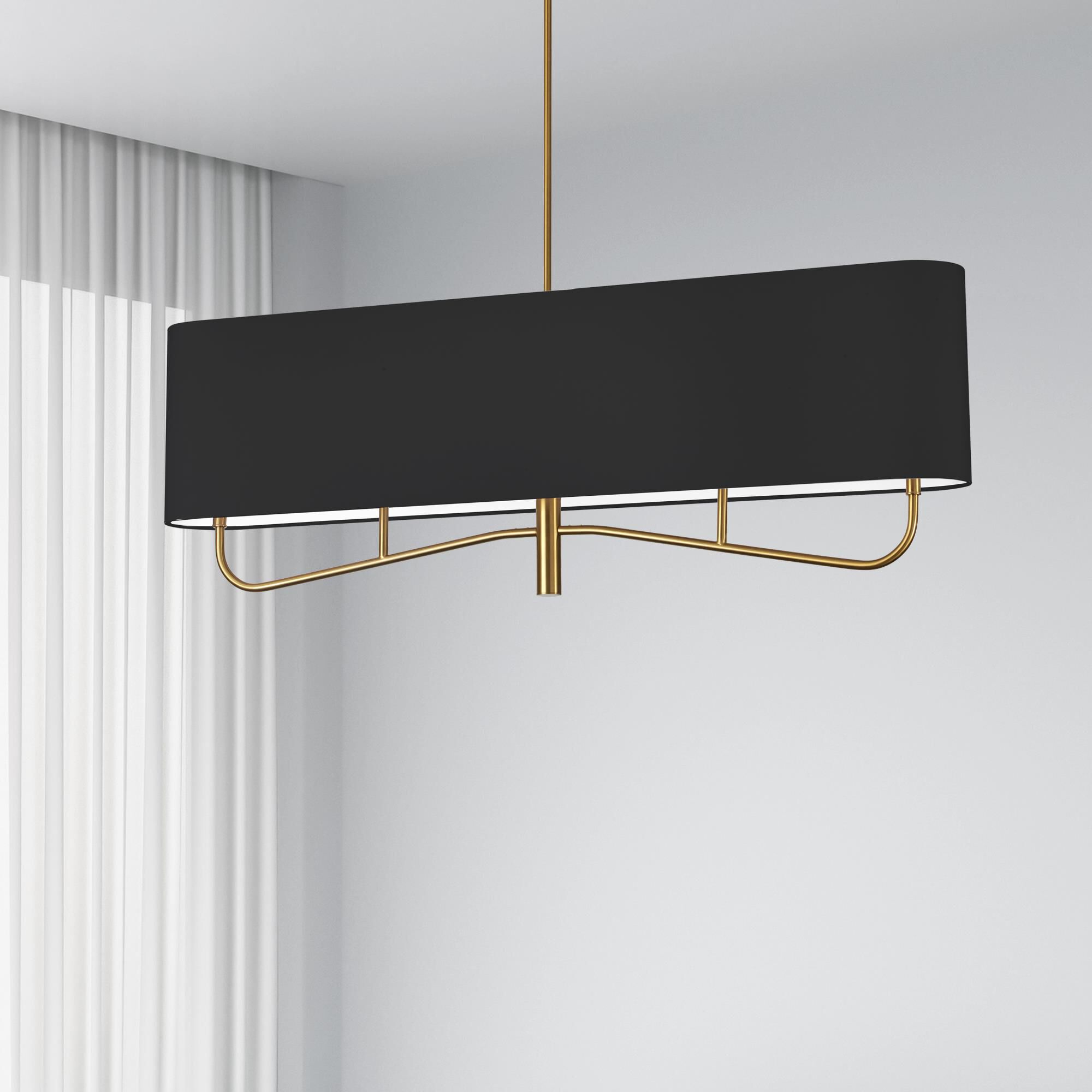 Shown in Aged Brass and Black finish and Black Fabric Oval shade