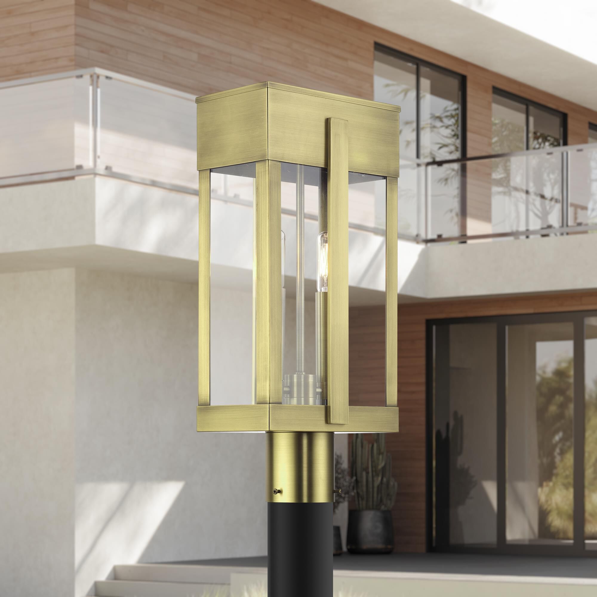 Shown in Antique Brass finish and Clear glass