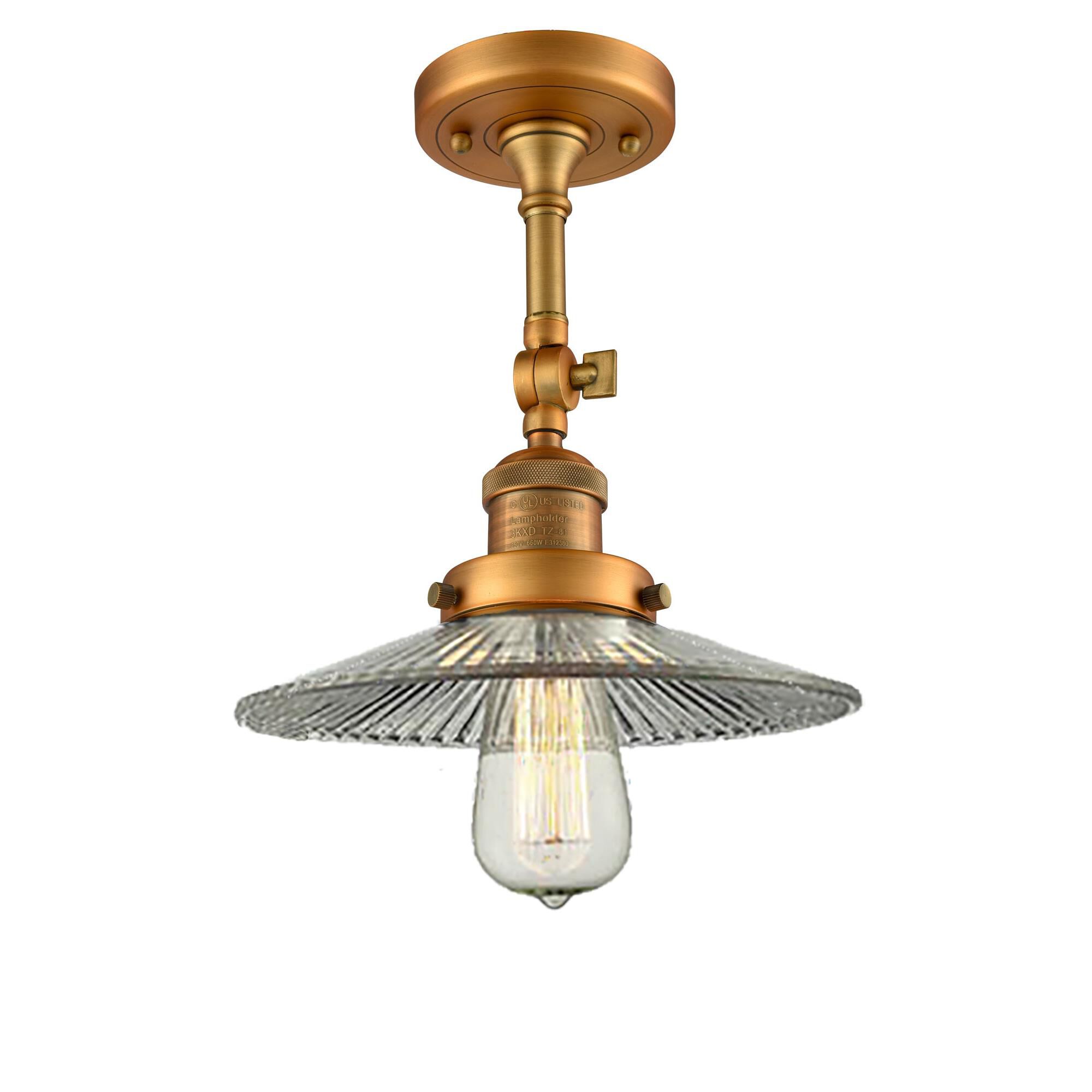 Shown in Brushed Brass finish and Clear Halophane glass