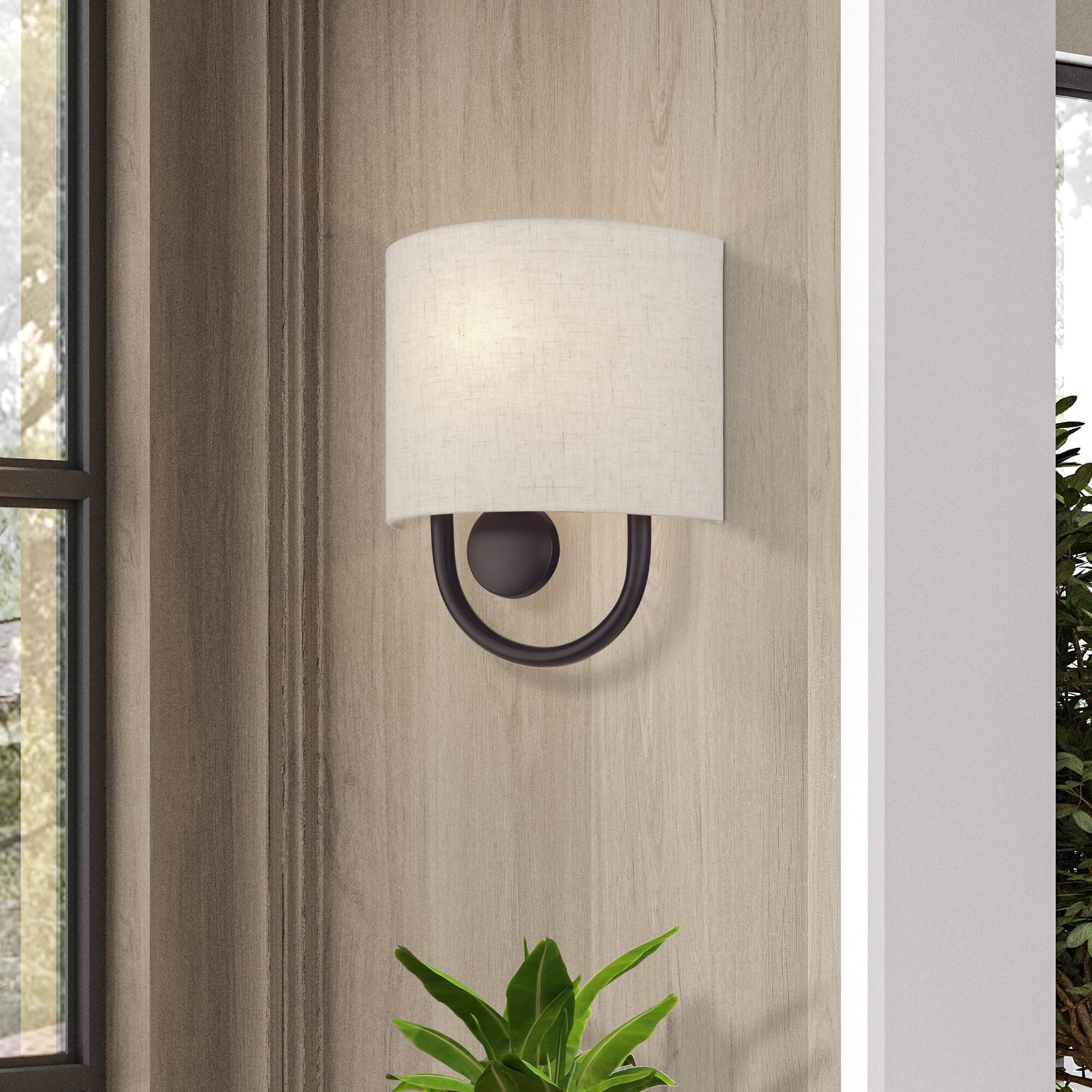 Shown in English Bronze finish and Hand Crafted Oatmeal Color Fabric Hardback with White Fabric Inside shade