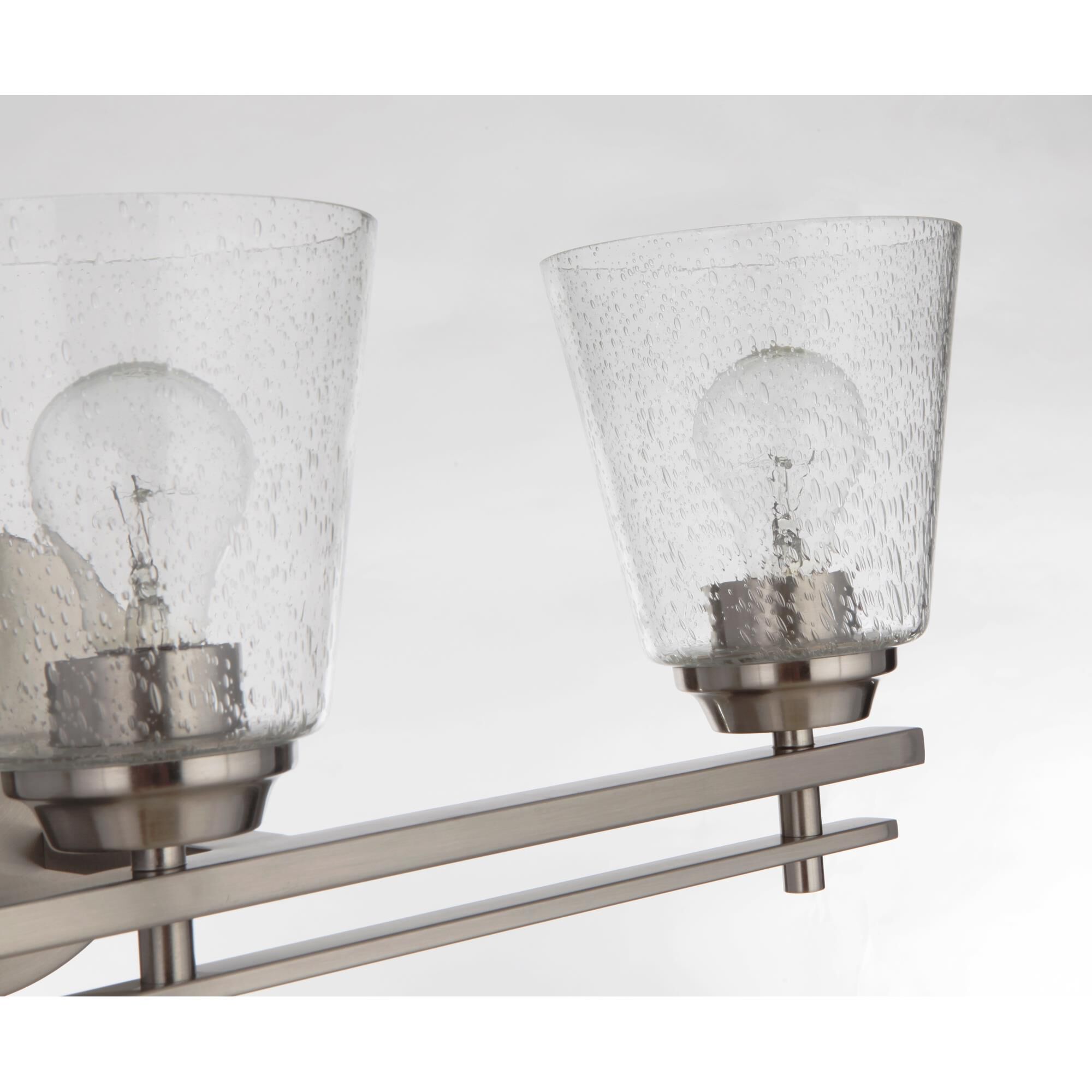 Shown in Brushed Polished Nickel finish and Clear Seeded glass and Glass shade