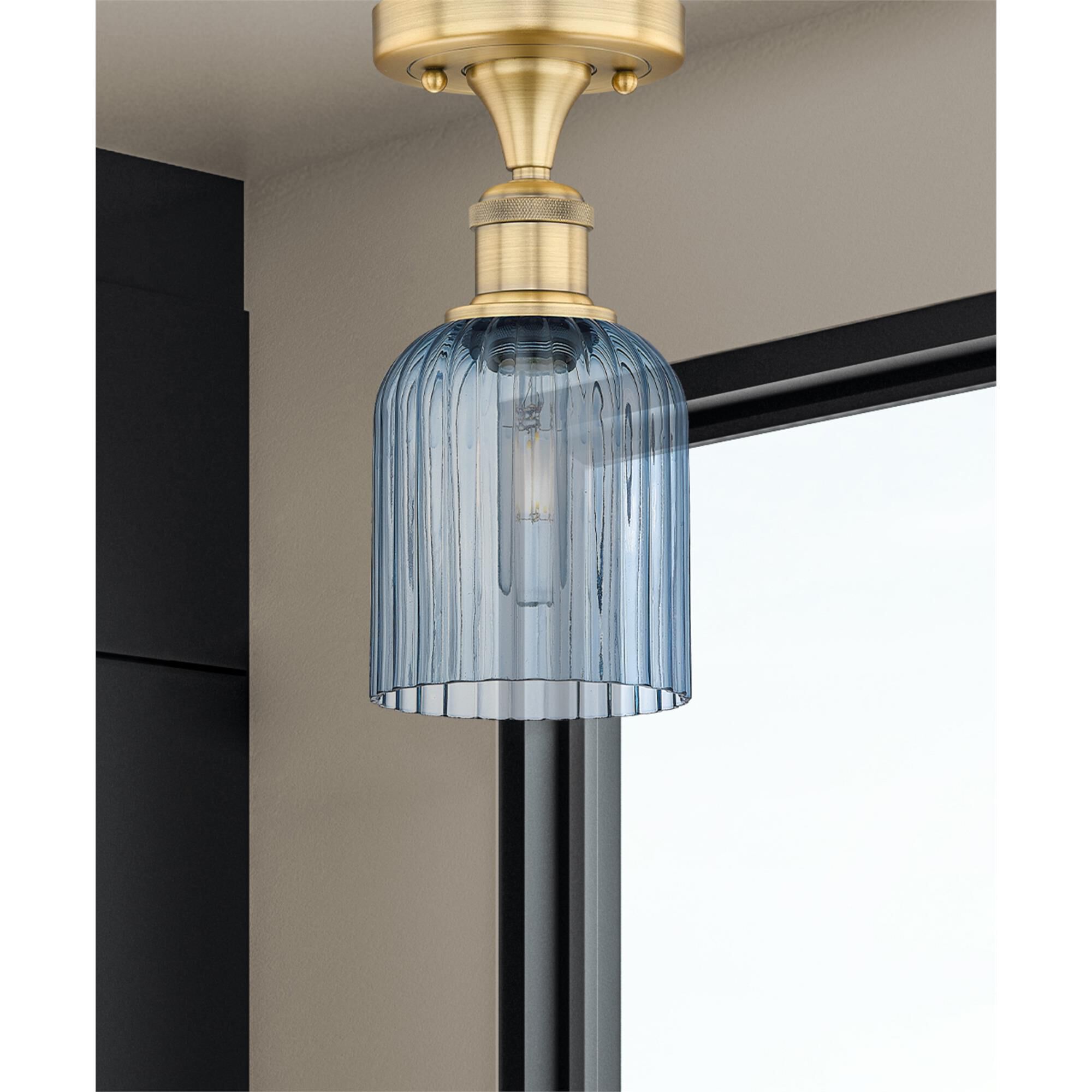 Shown in Brushed Brass finish and Princess Blue glass