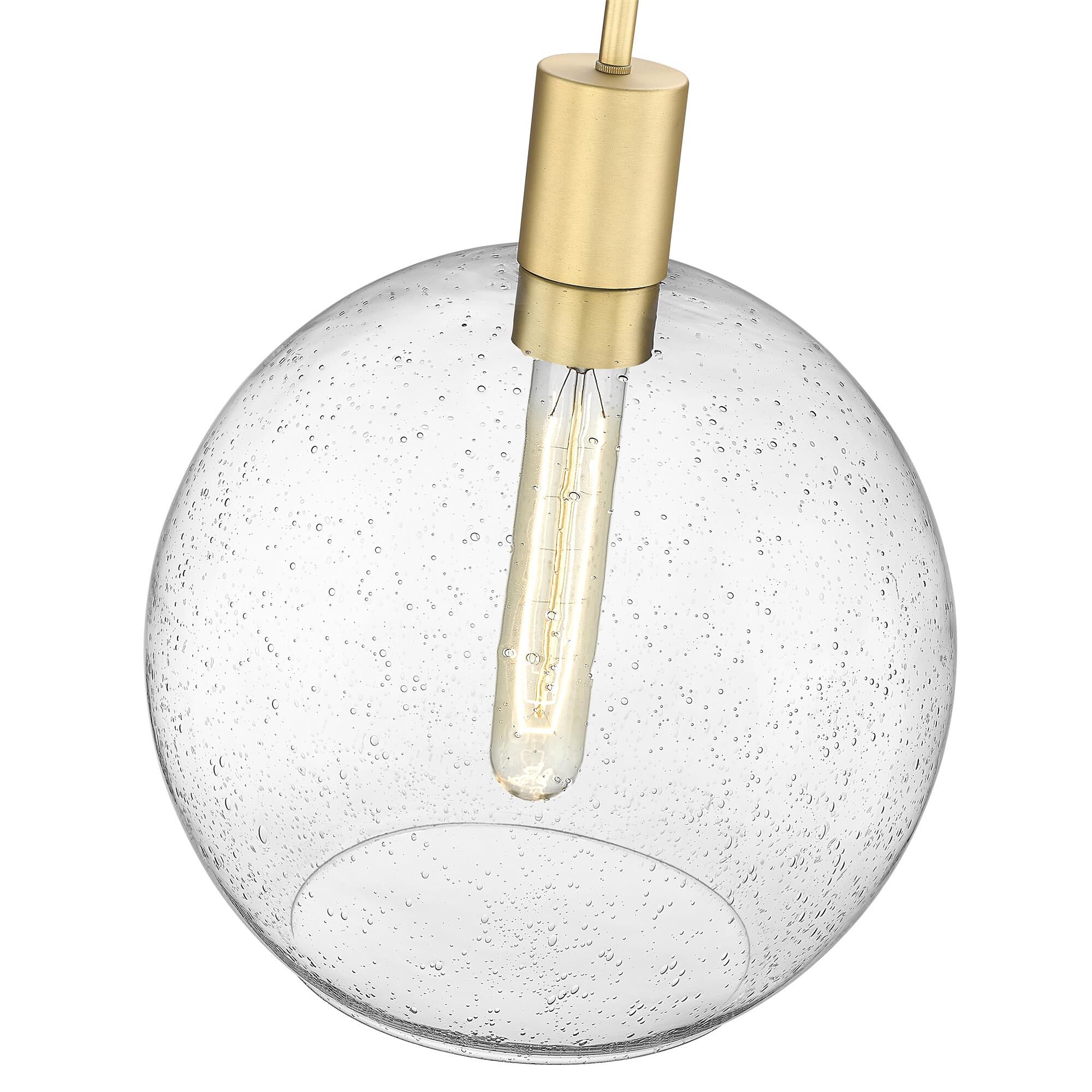Shown in Olde Brass finish and Clear Seedy glass