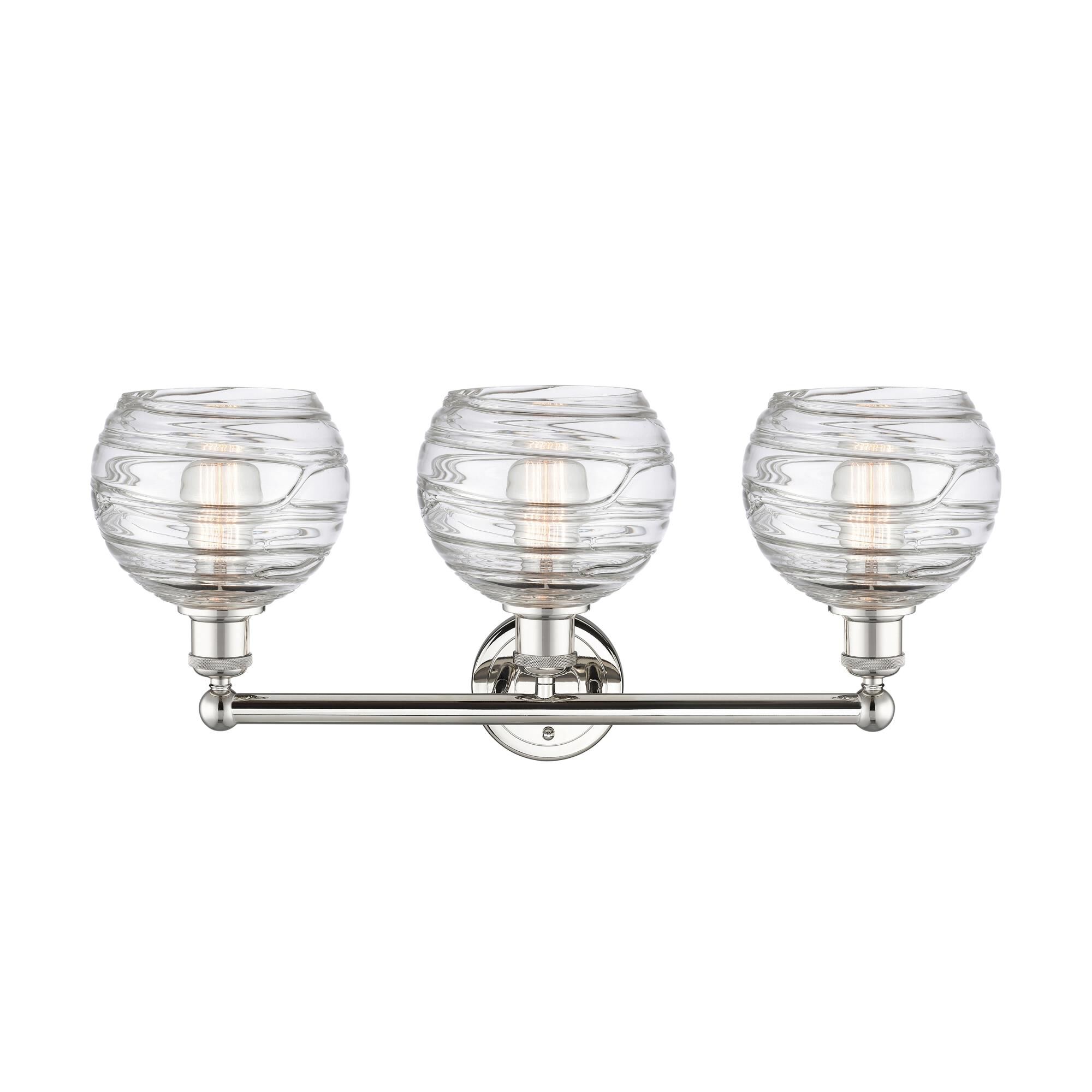 Shown in Polished Nickel finish and Clear Deco Swirl glass