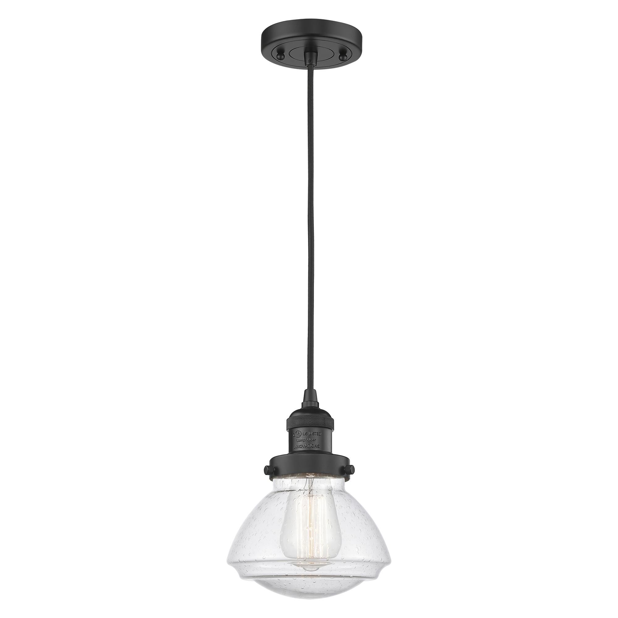 Shown in Matte Black finish and Seeded Seedy Olean glass and Bulb Tint - Amber accent