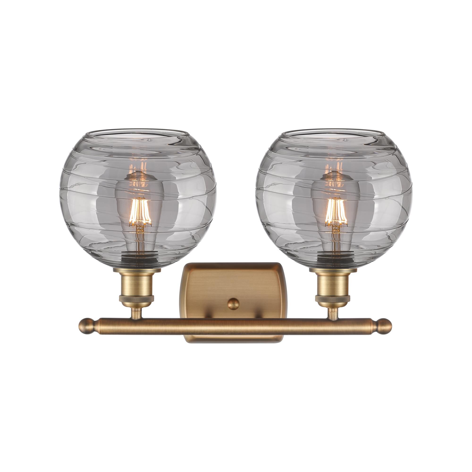 Shown in Brushed Brass finish and Light Smoke Deco Swirl glass