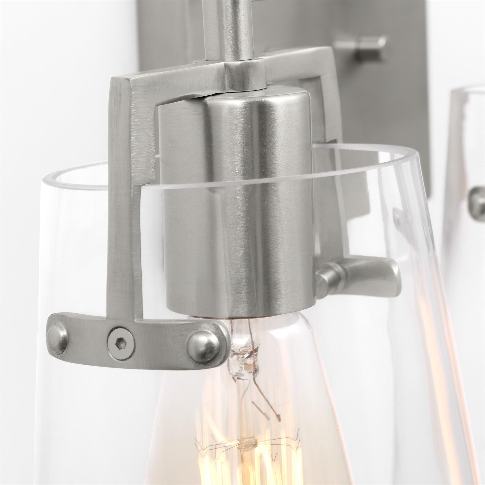 Shown in Brushed Steel finish and Clear Glass s shade
