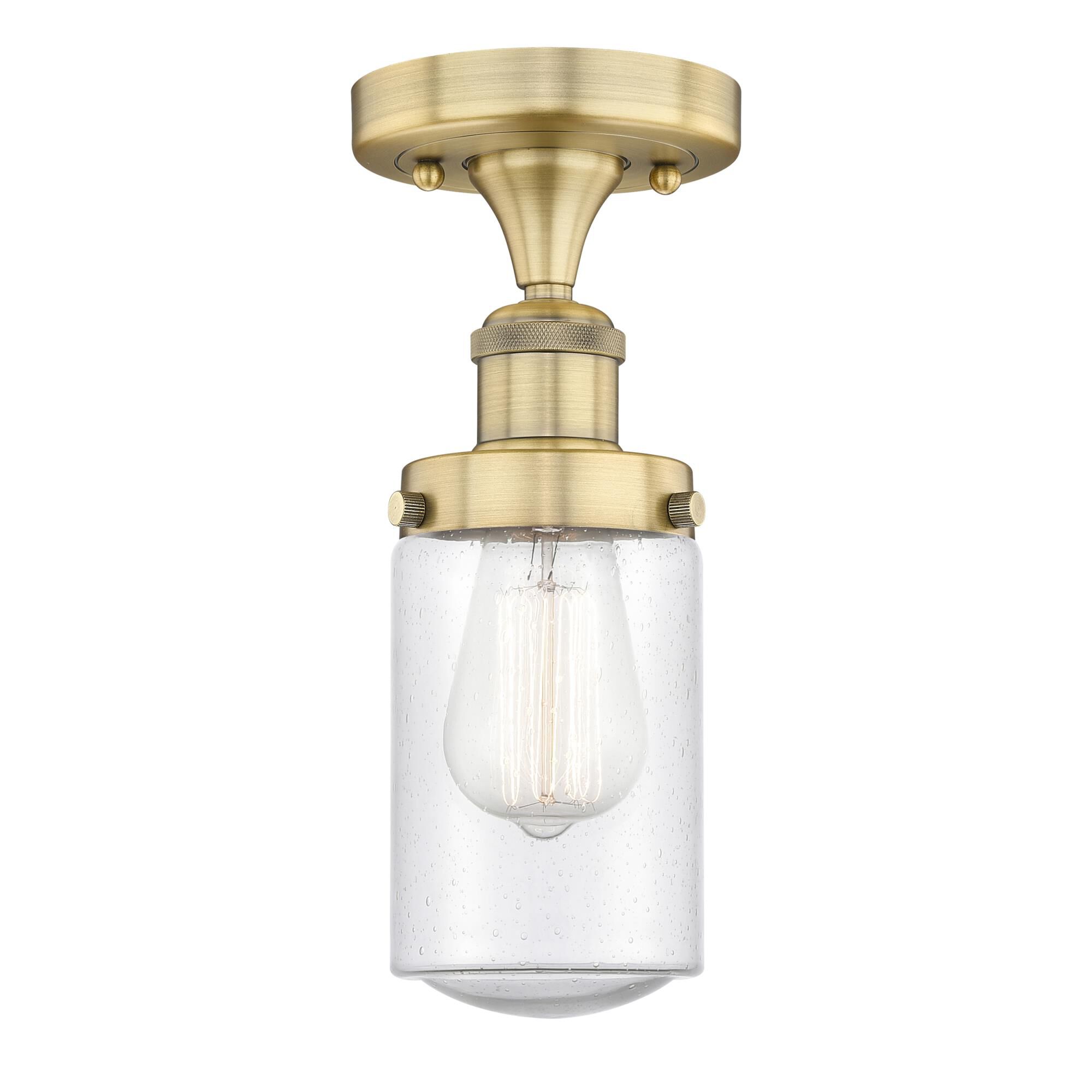 Shown in Brushed Brass finish and Seedy glass