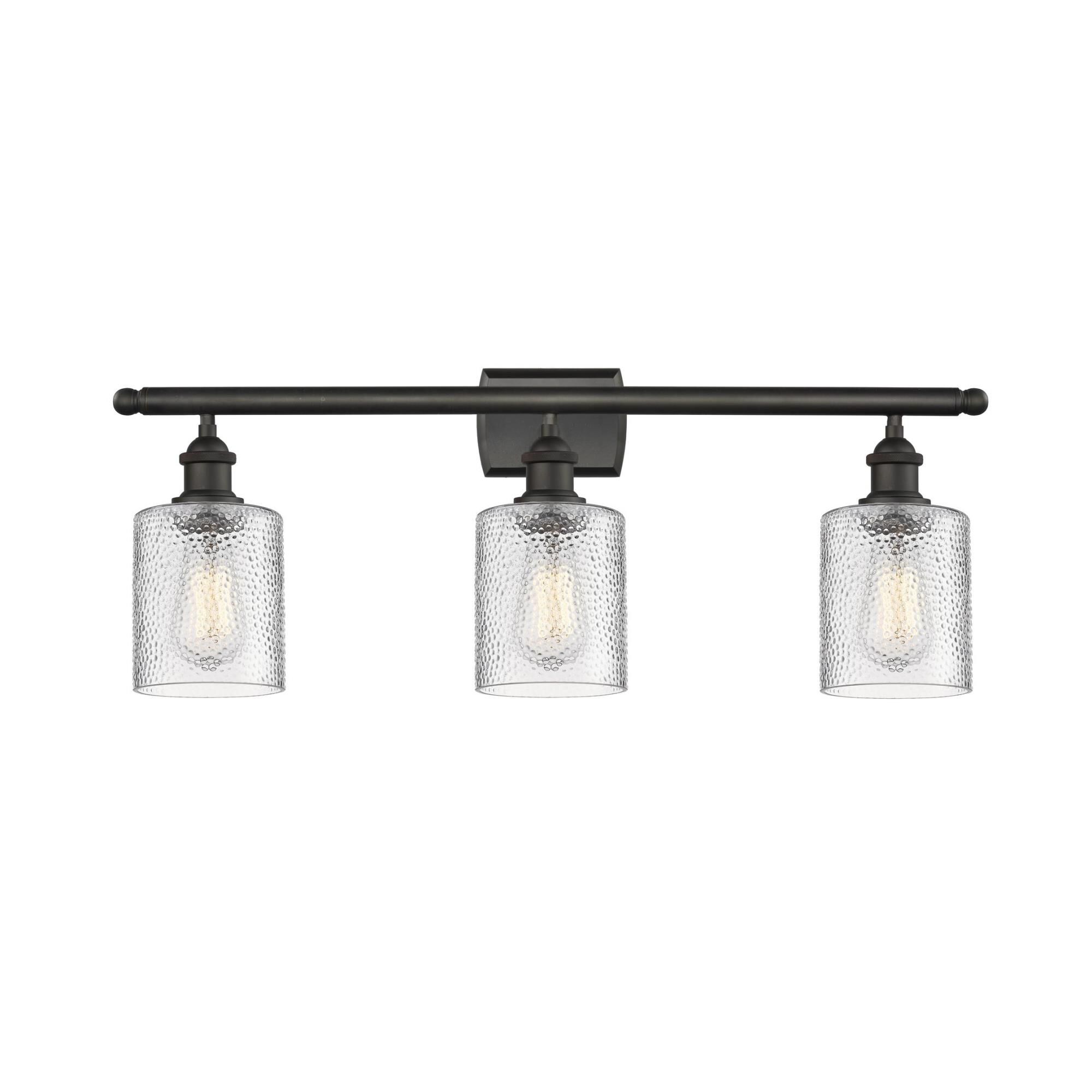 Shown in Oil Rubbed Bronze finish and Clear Ripple glass