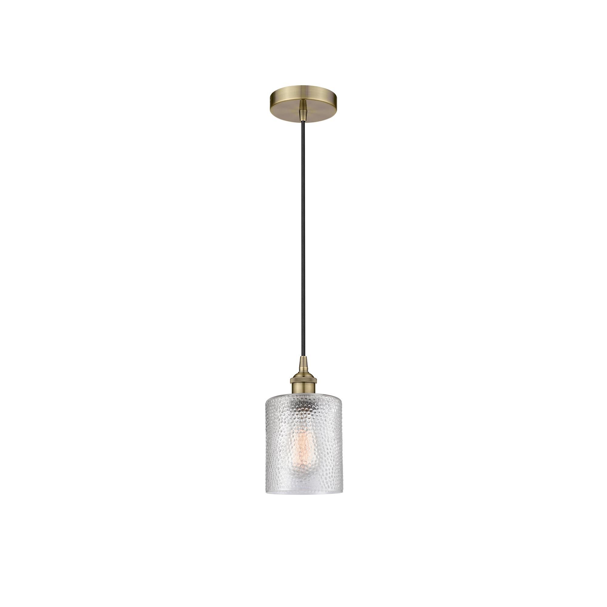 Shown in Antique Brass finish and Clear Cobbleskill glass