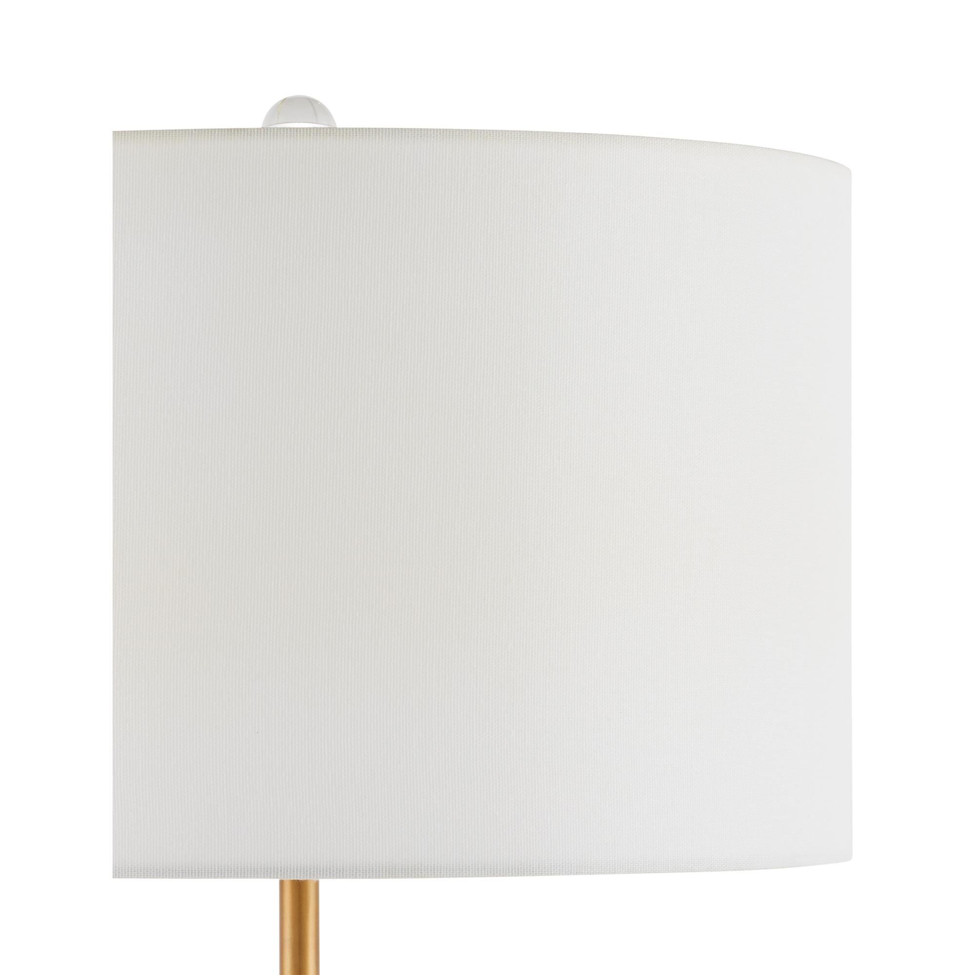Shown in Clear, Antique Brass finish and Off-White Fine Linen shade