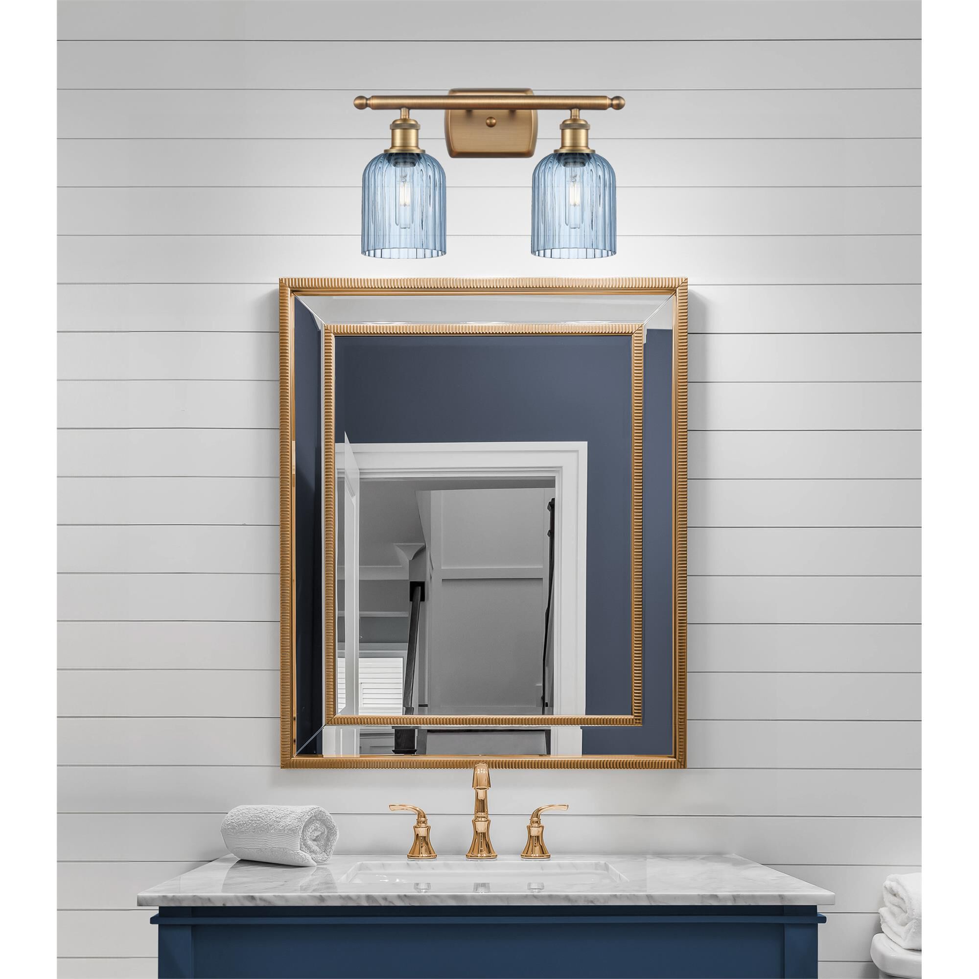 Shown in Brushed Brass finish and Princess Blue glass