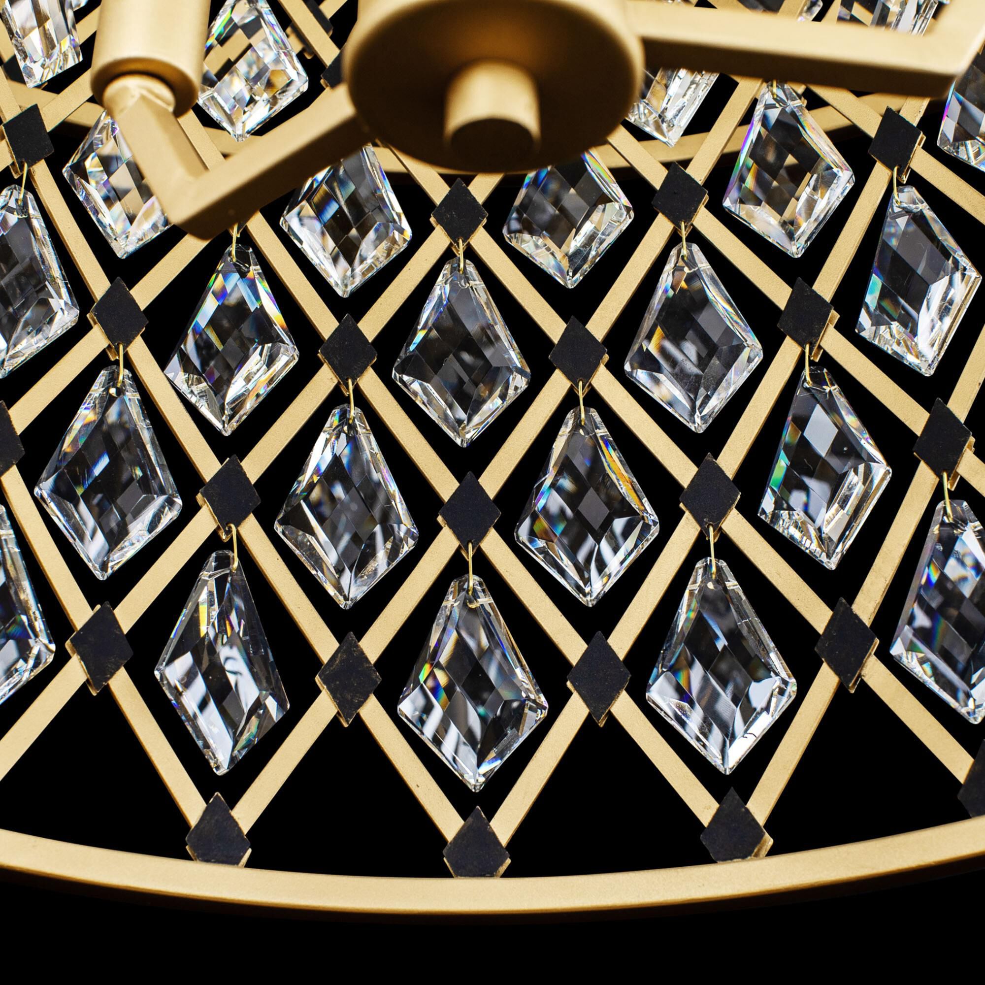 Shown in French Gold and Matte Black finish and Clear crystal