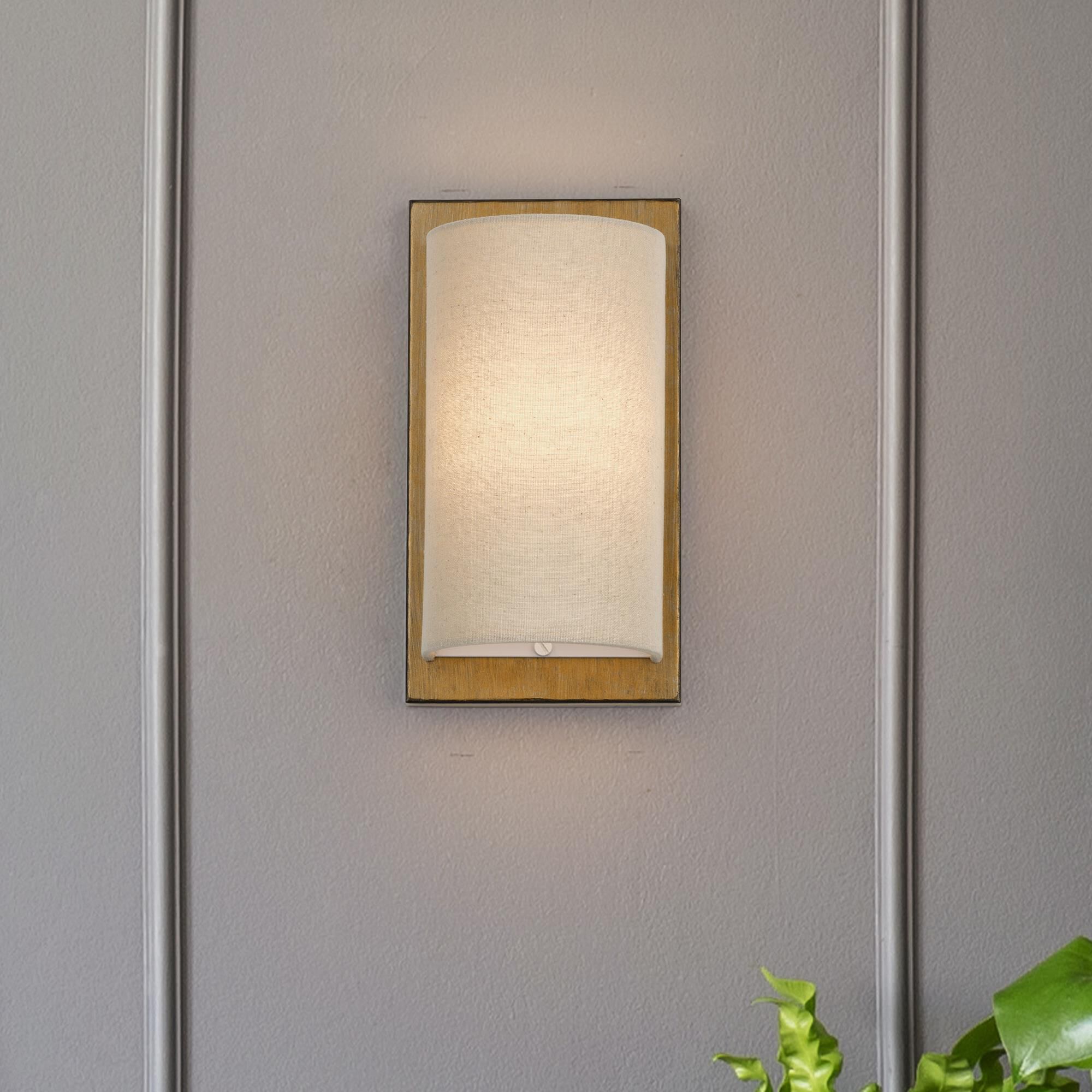Shown in Antique Gold Leaf finish and Hand Crafted Parchment Color Hardback Fabric shade