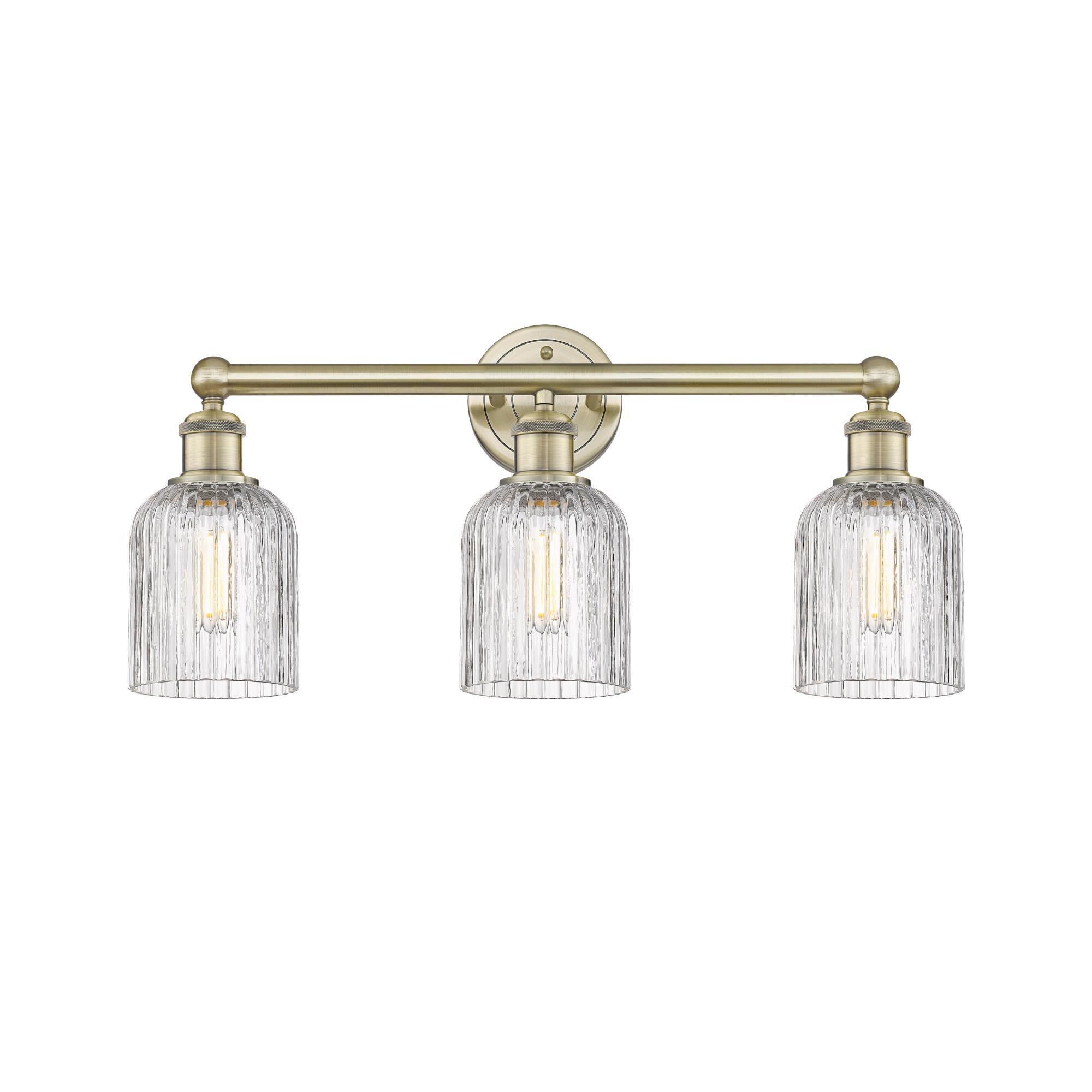 Shown in Antique Brass finish and Clear glass