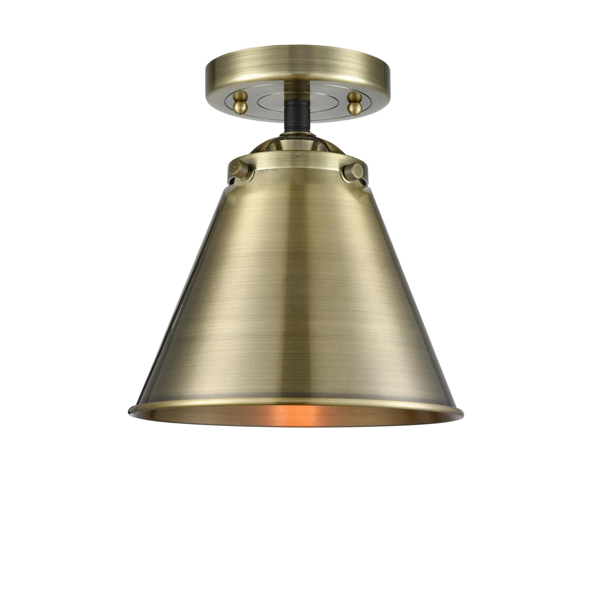 Shown in Black Antique Brass finish and Metal - Antique Brass shade