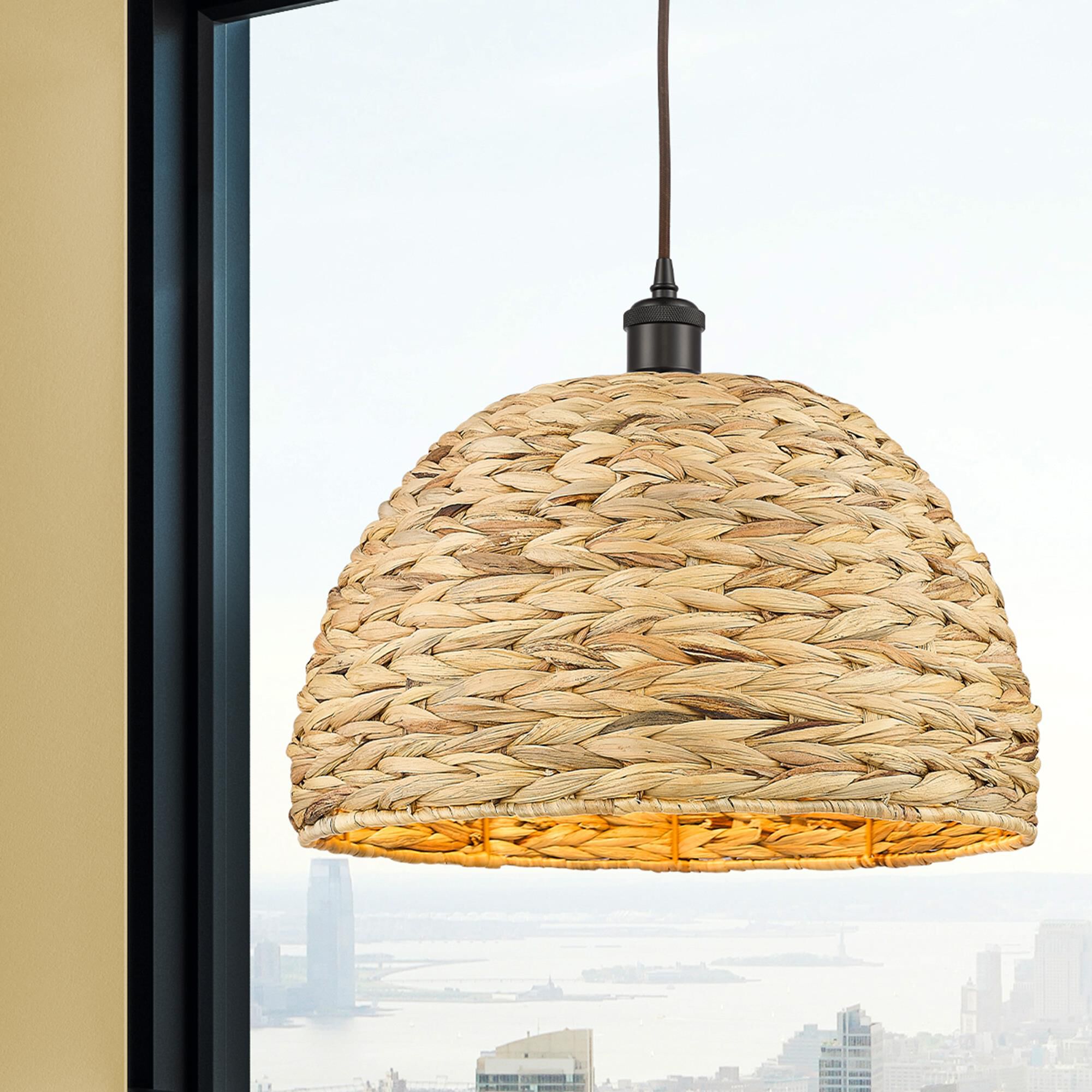 Shown in Oiled Brass finish and Natural Rattan Rattan shade