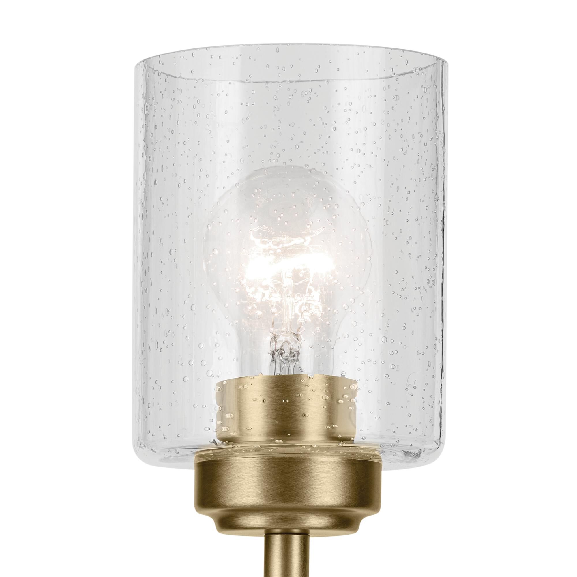 Shown in Natural Brass finish and Clear Seeded glass