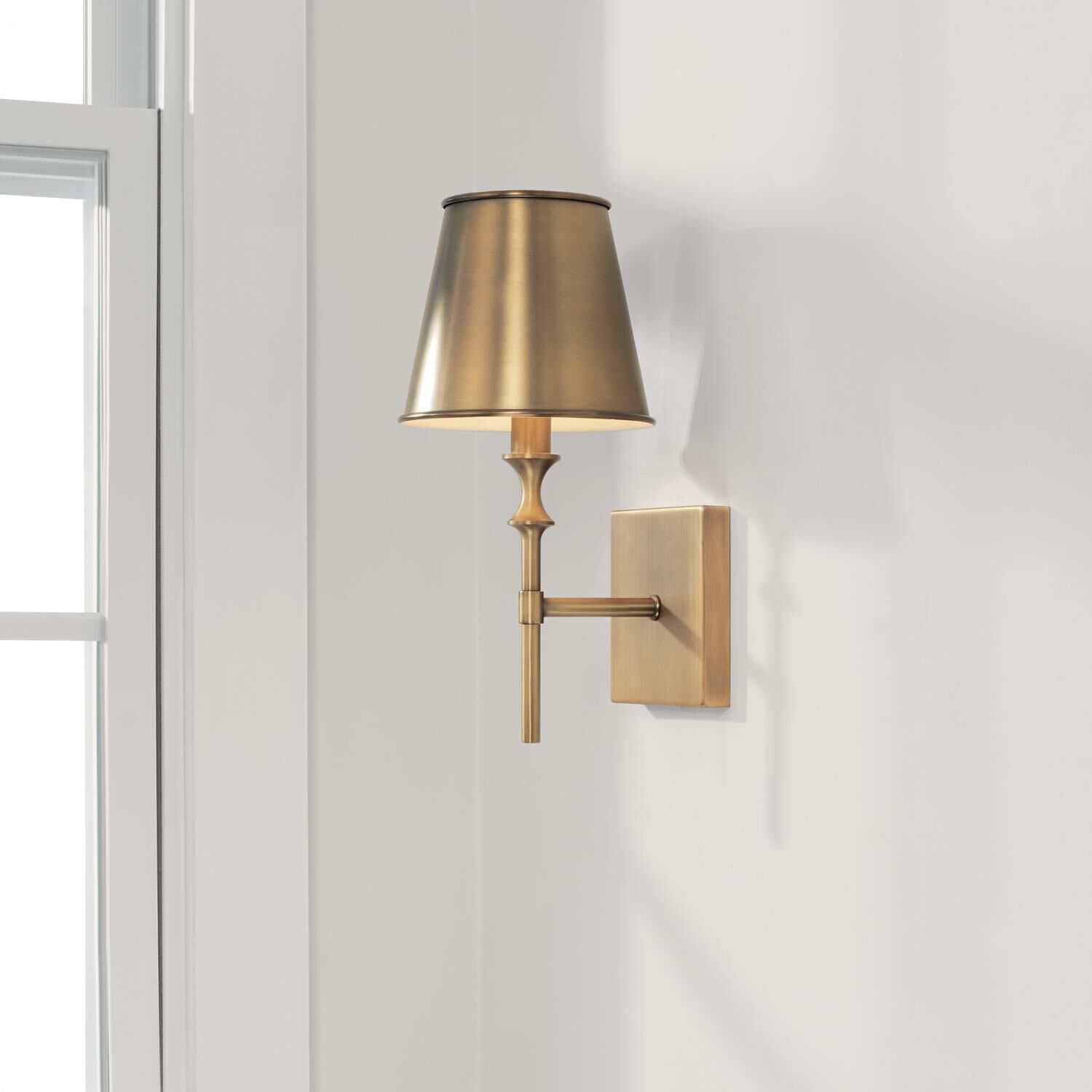 Shown in Aged Brass finish and Aged Brass Metal Stay-Straight  with White Interior shade