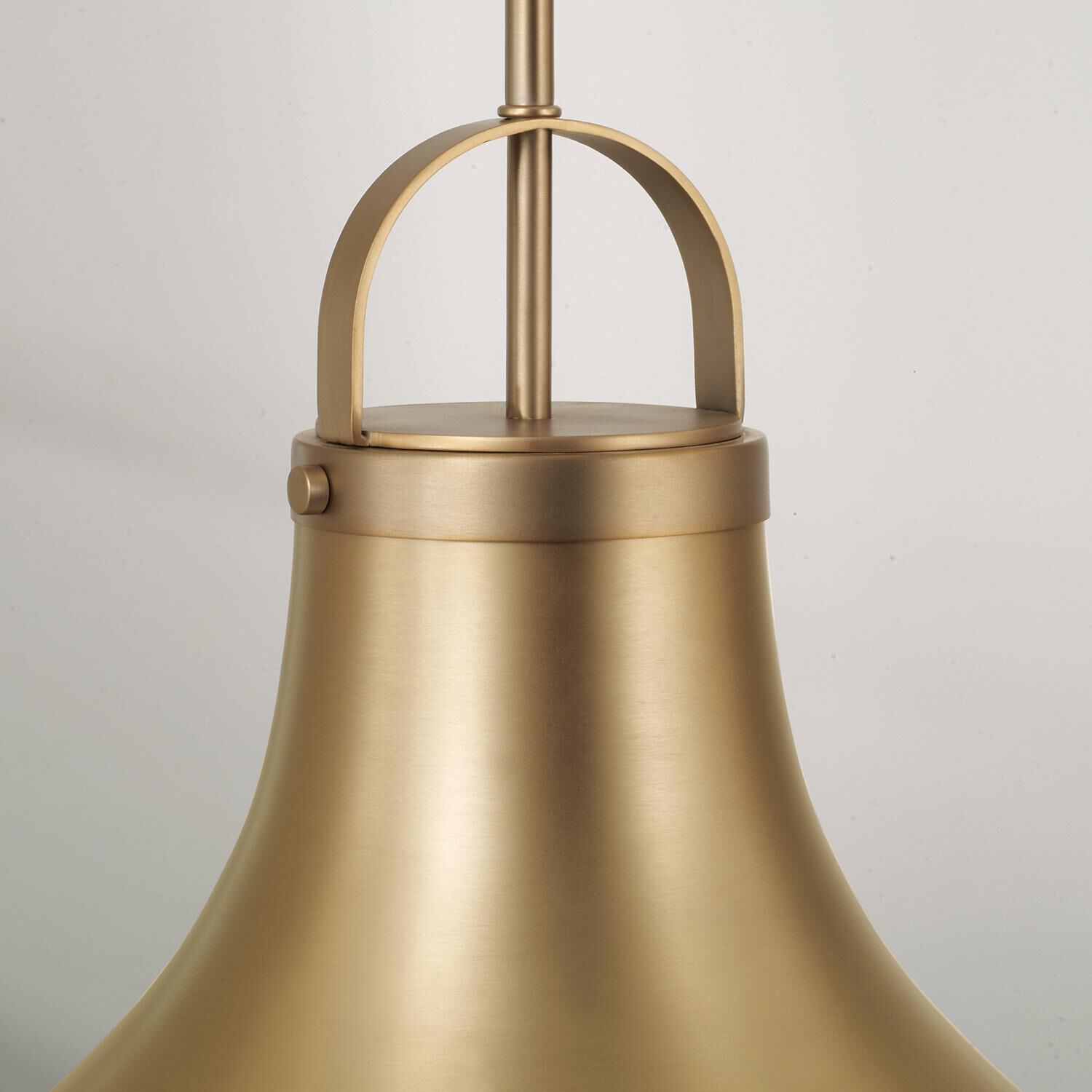 Shown in Aged Brass finish and Soft White glass