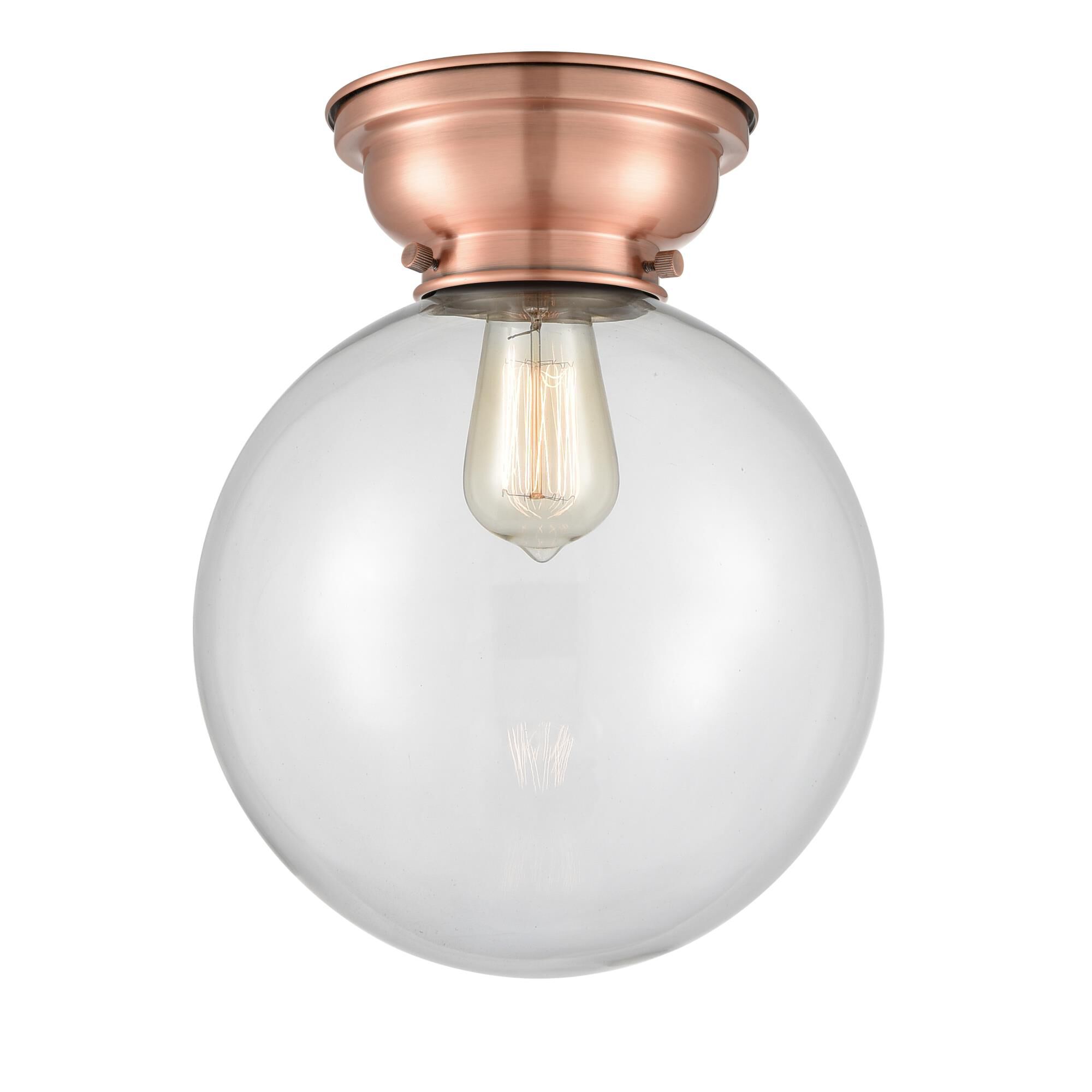 Shown in Antique Copper finish and Globe glass and Glass shade