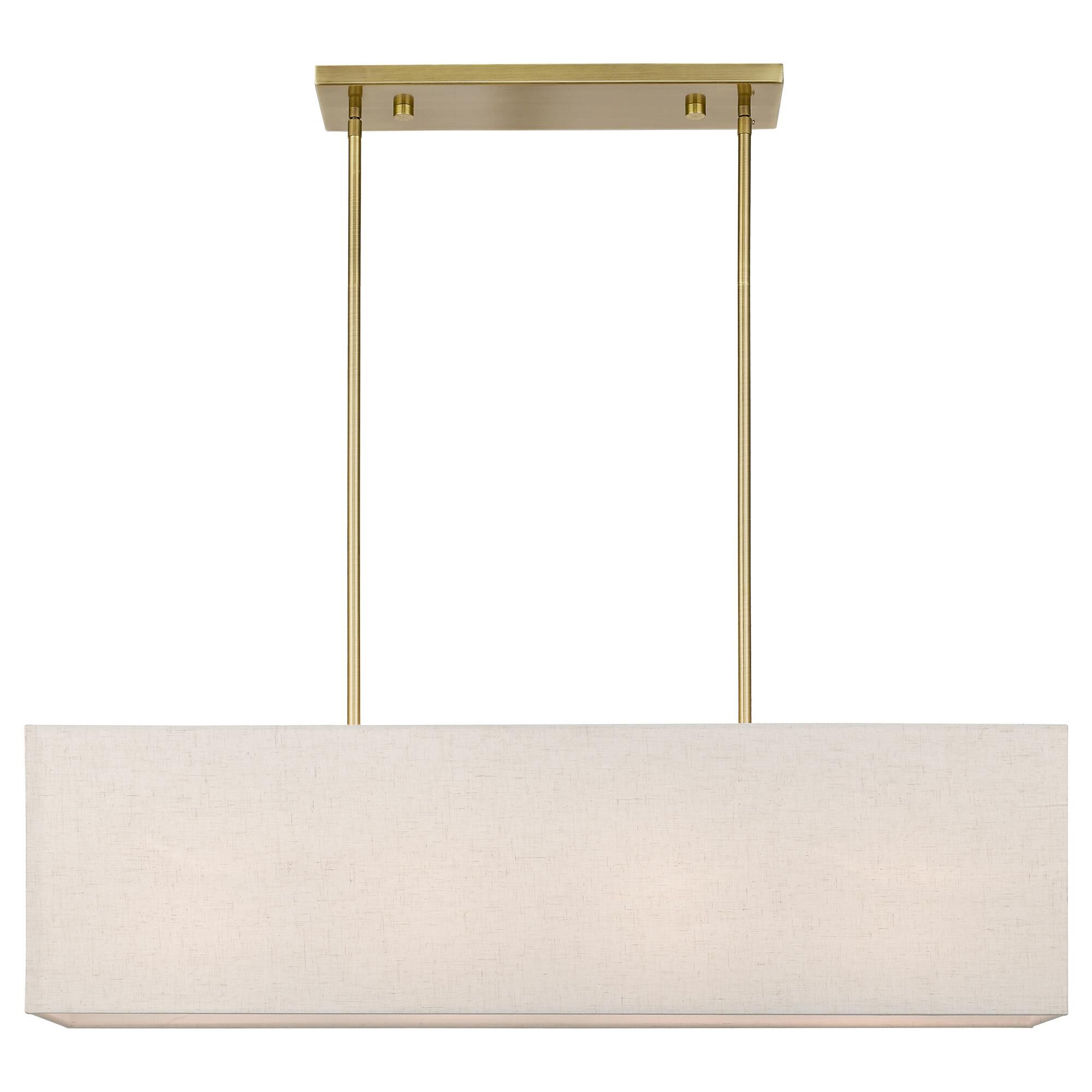 Shown in Antique Brass finish and Hand Crafted Oatmeal Color Hardback Fabric With White Fabric Inside shade